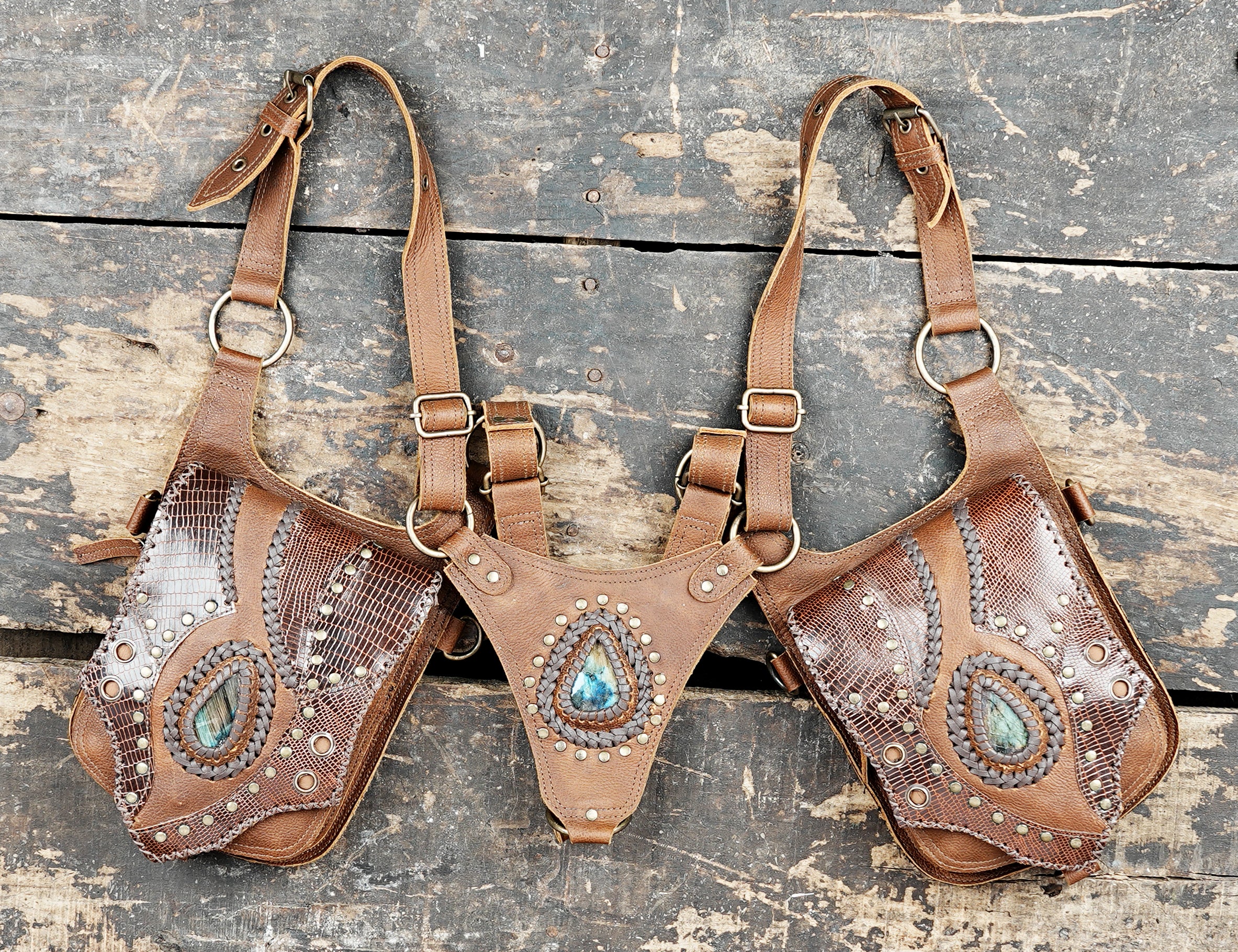 “Brown boho-style leather holster with gemstone centerpiece and stitched details”