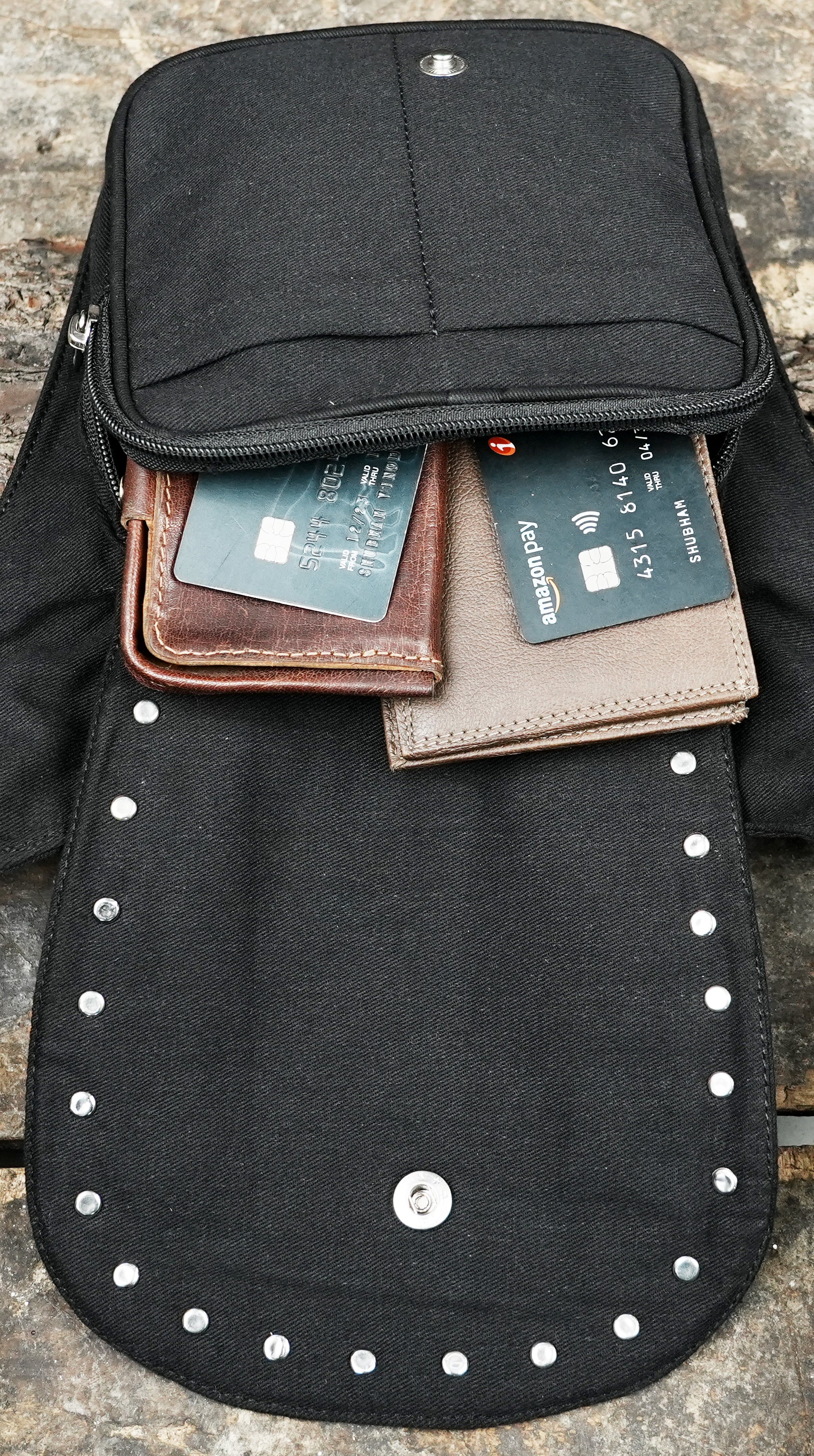 multi-compartment fanny pack with studded canvas and lace details