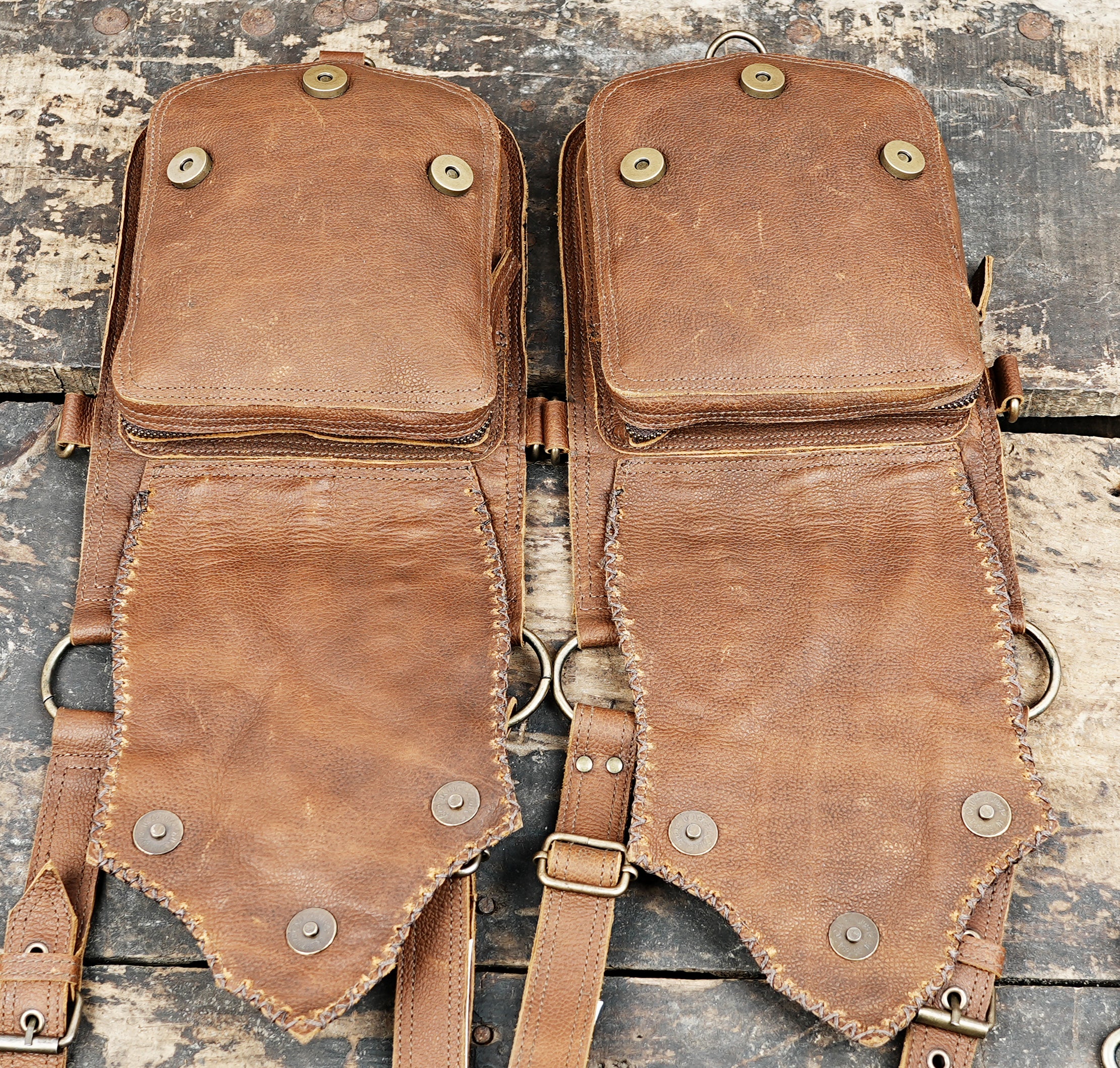 style leather holster with textured panels and decorative stone accents”