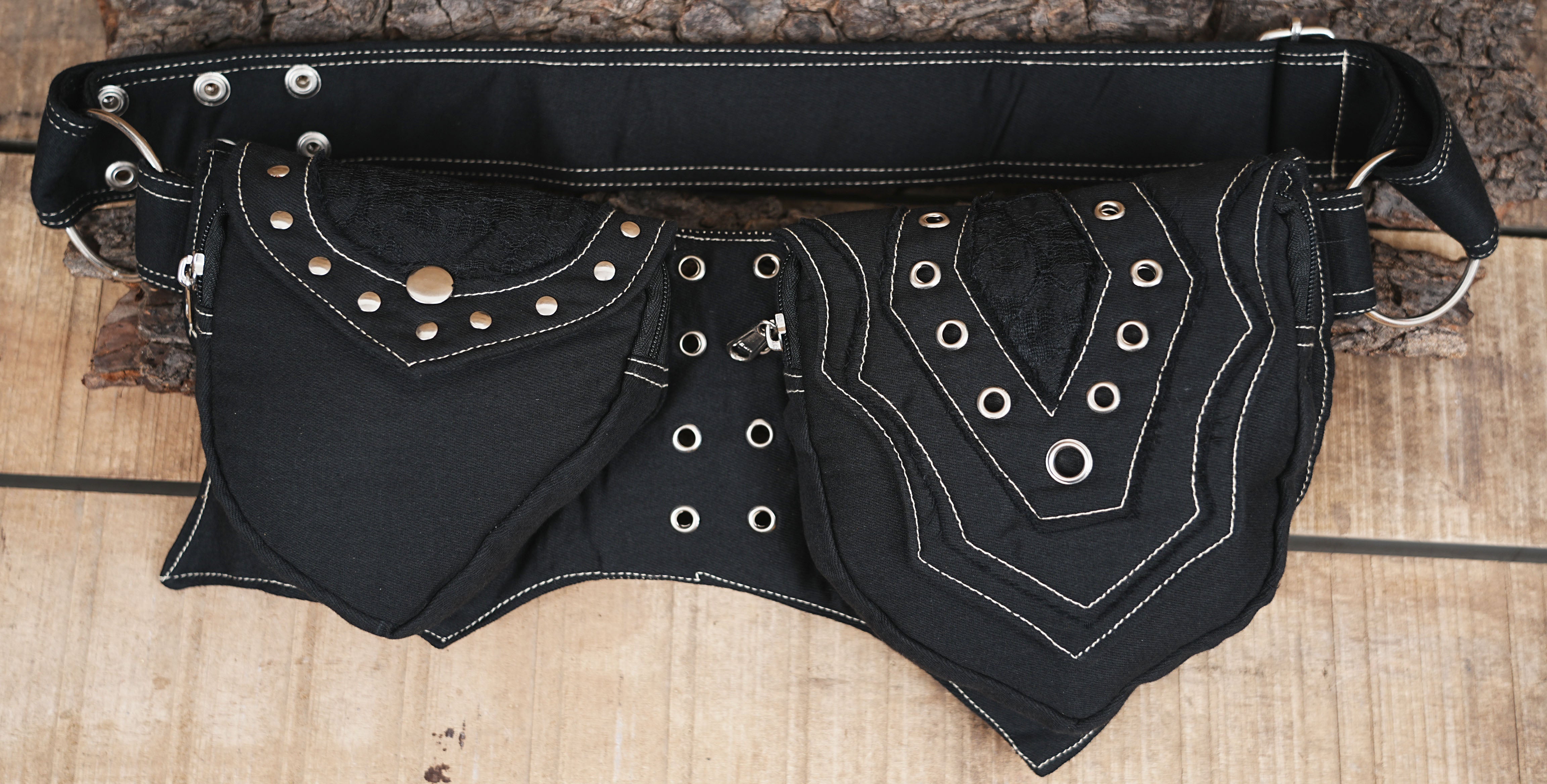 Black cotton waist belt bag with multiple pouches and silver stud accents
