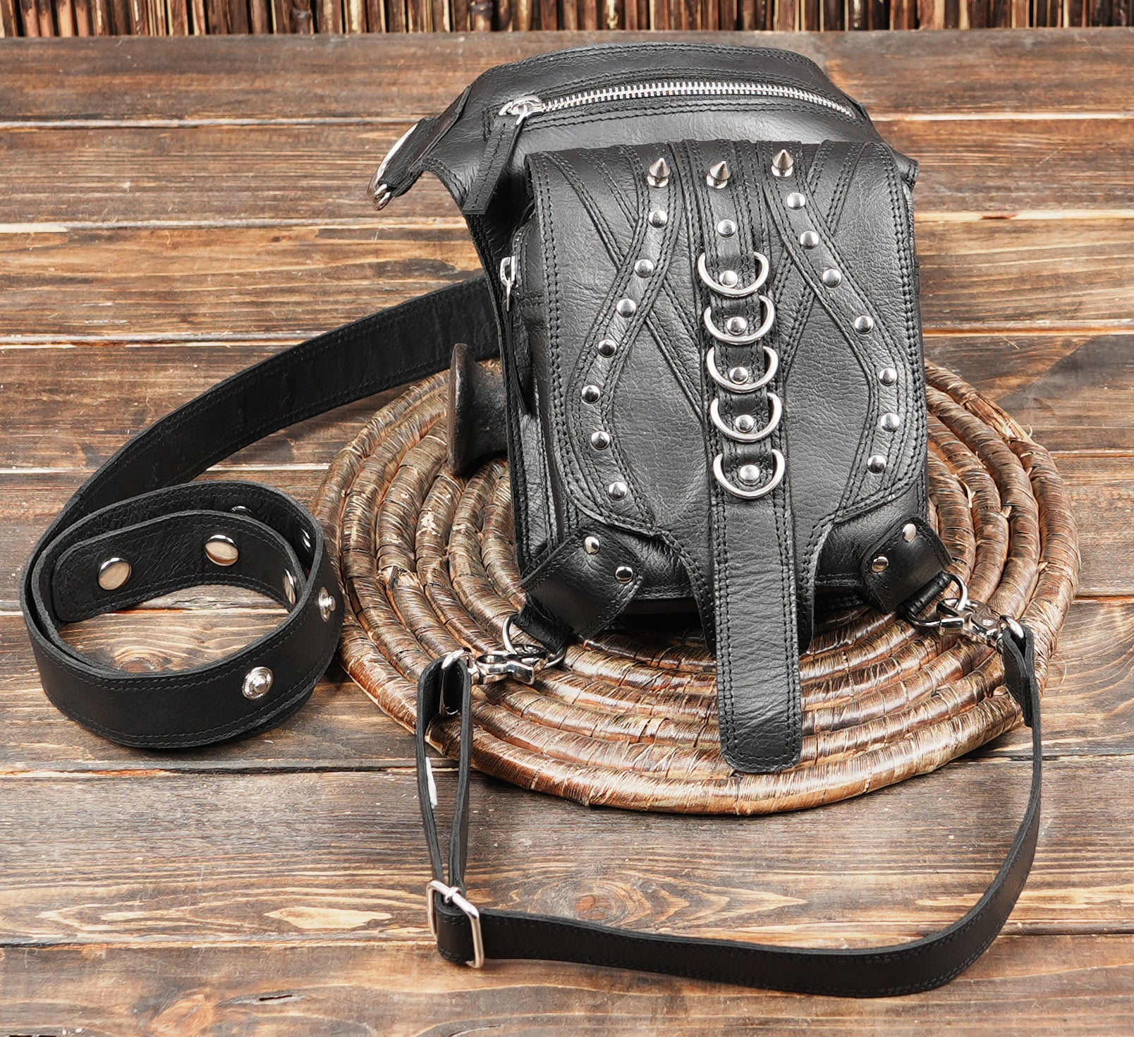 Black leather utility thigh belt with metal accessories