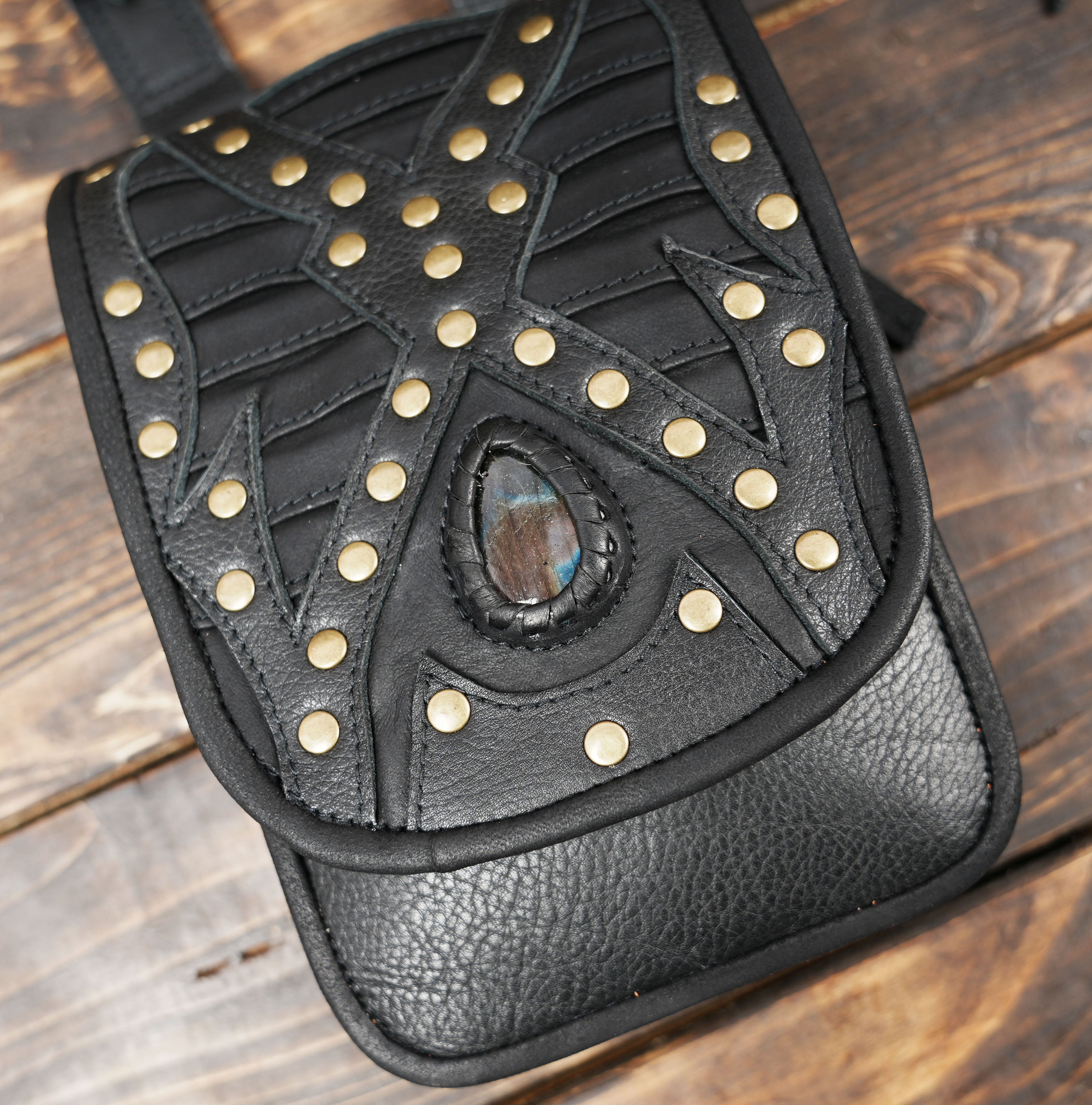 Festival-ready black leather holster harness with gemstones