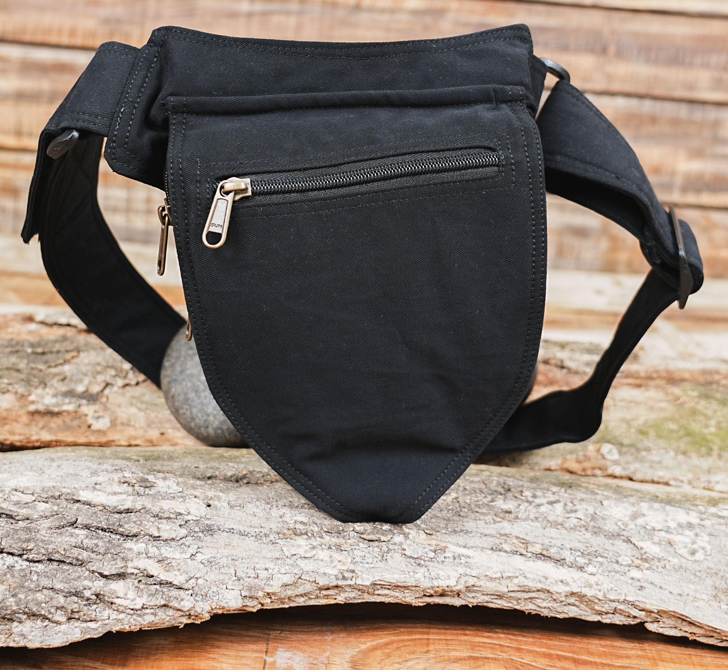 Minimalist hip pouch made from black canvas fabric
