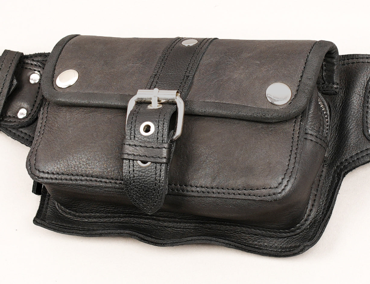Handcrafted leather hip belt with metal hardware
