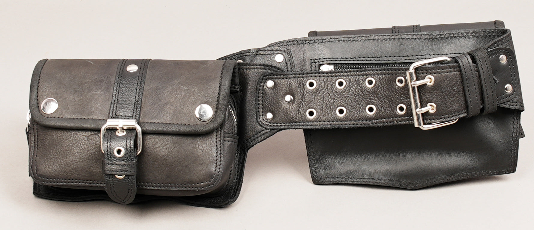 Adjustable leather waist belt with metal eyelets