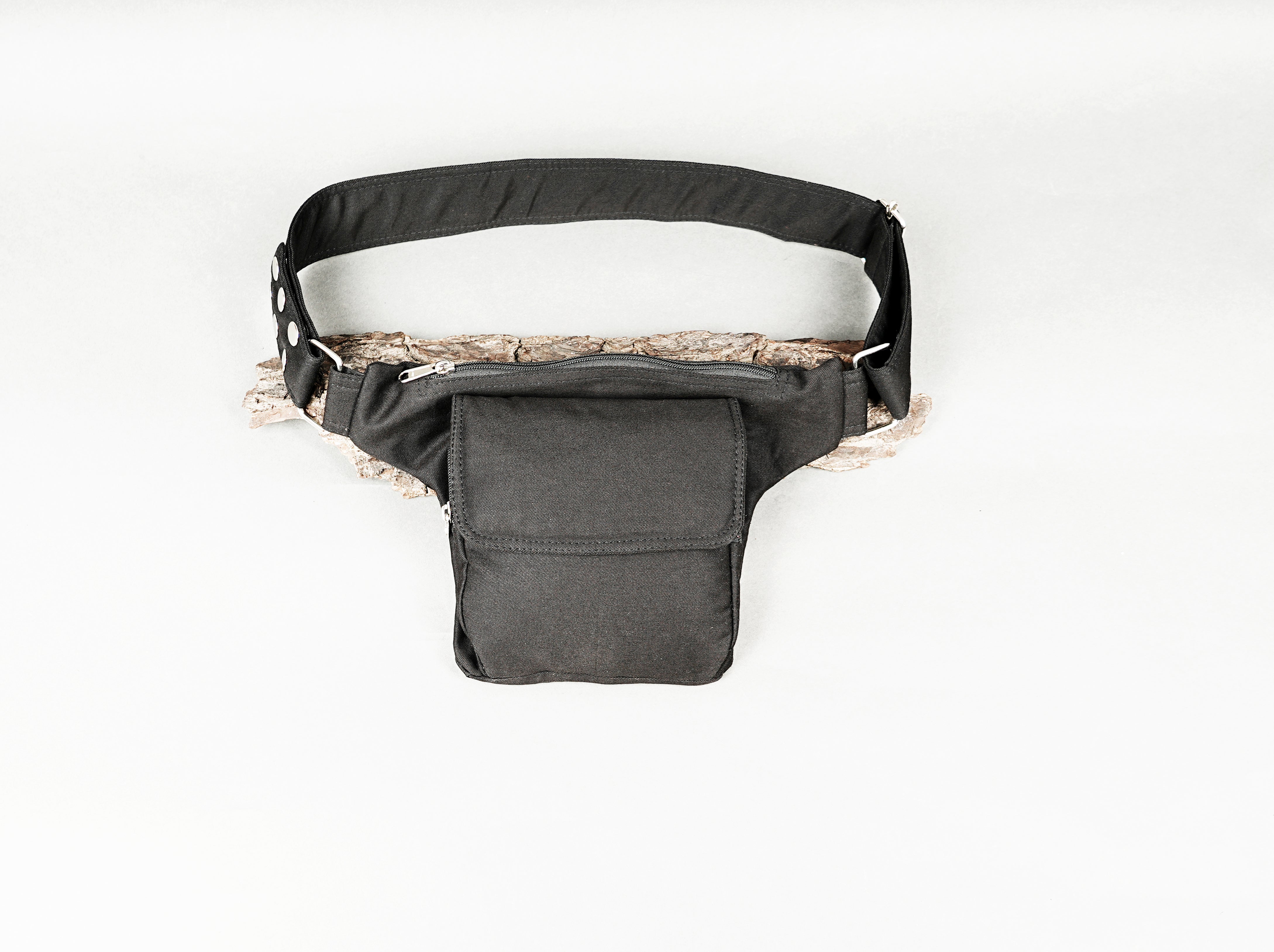 Black fabric utility belt with a single front pouch and zipper closure.