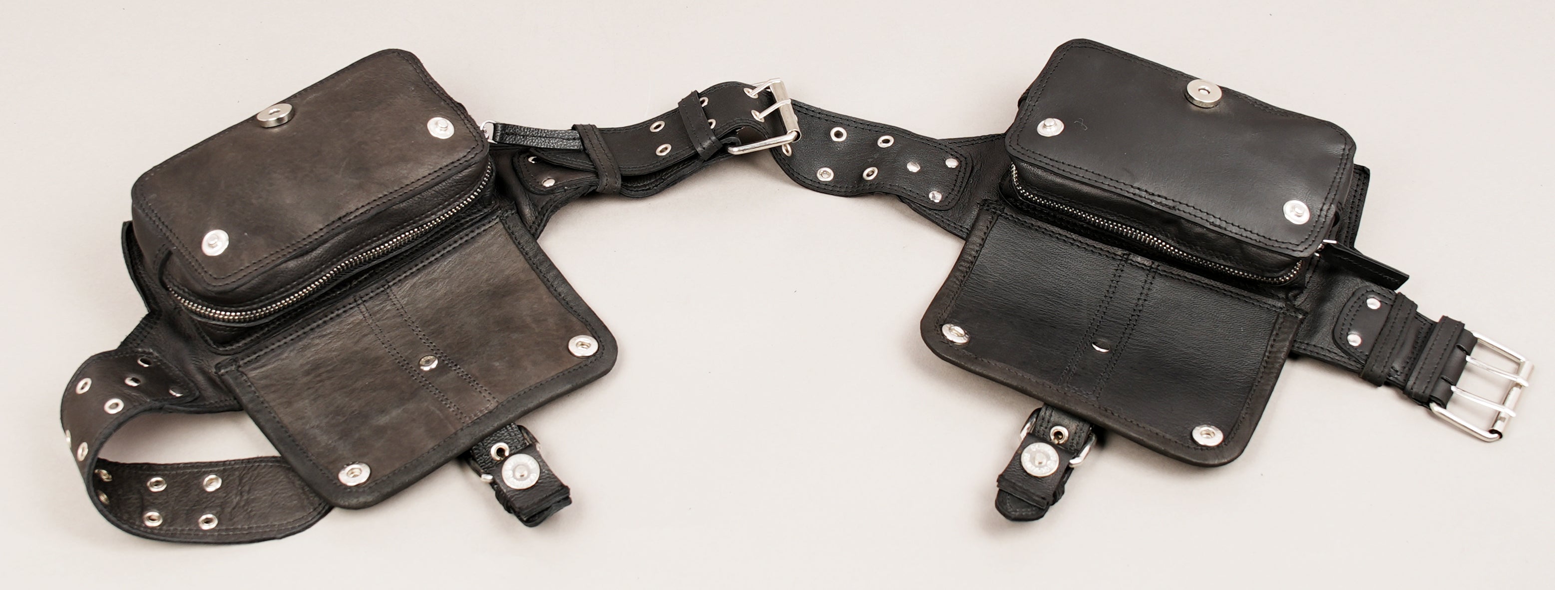 Black leather waist belt with heavy-duty hardware