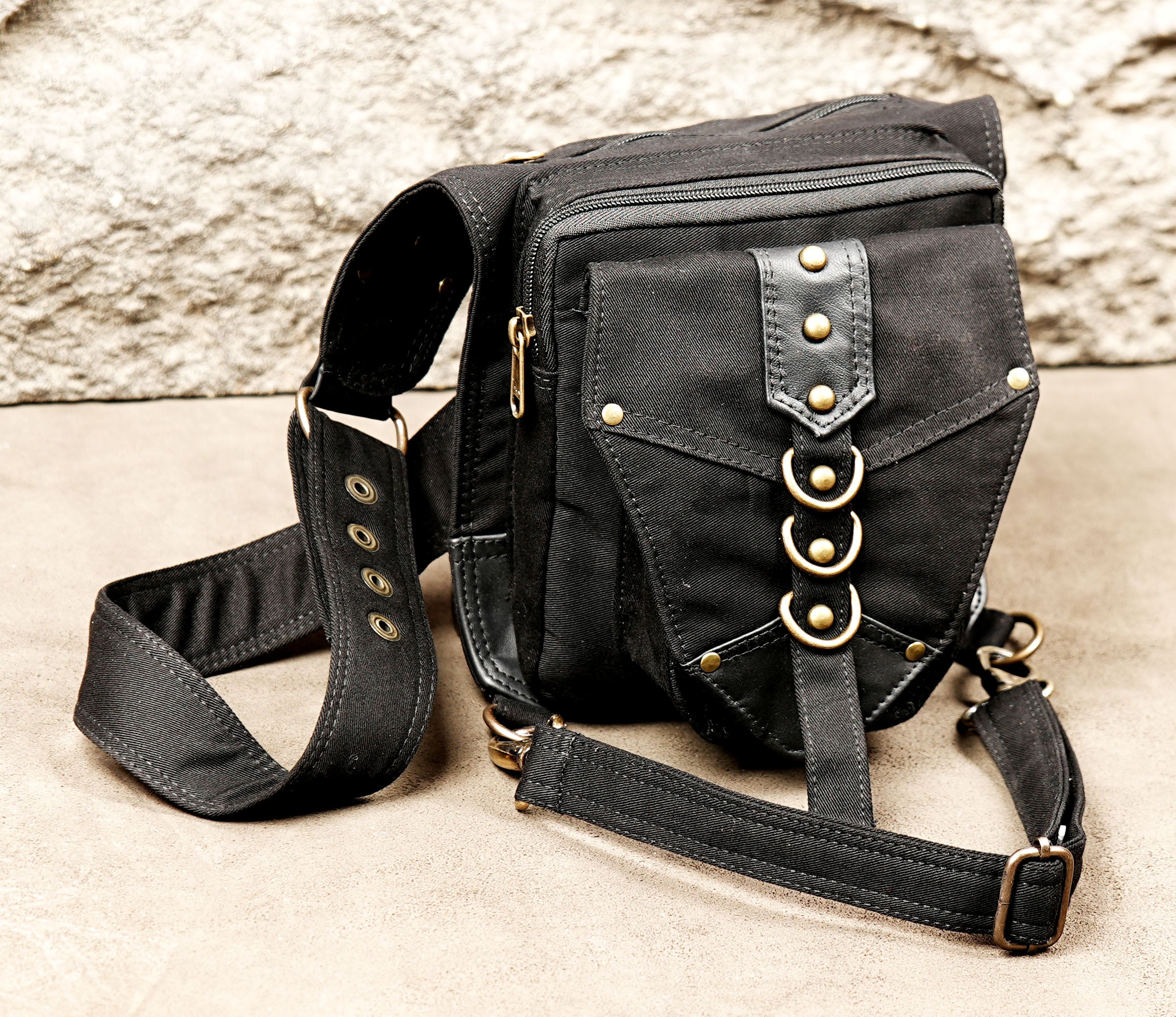 Gothic cyberpunk canvas waist pack with metal D-rings and adjustable thigh strap.