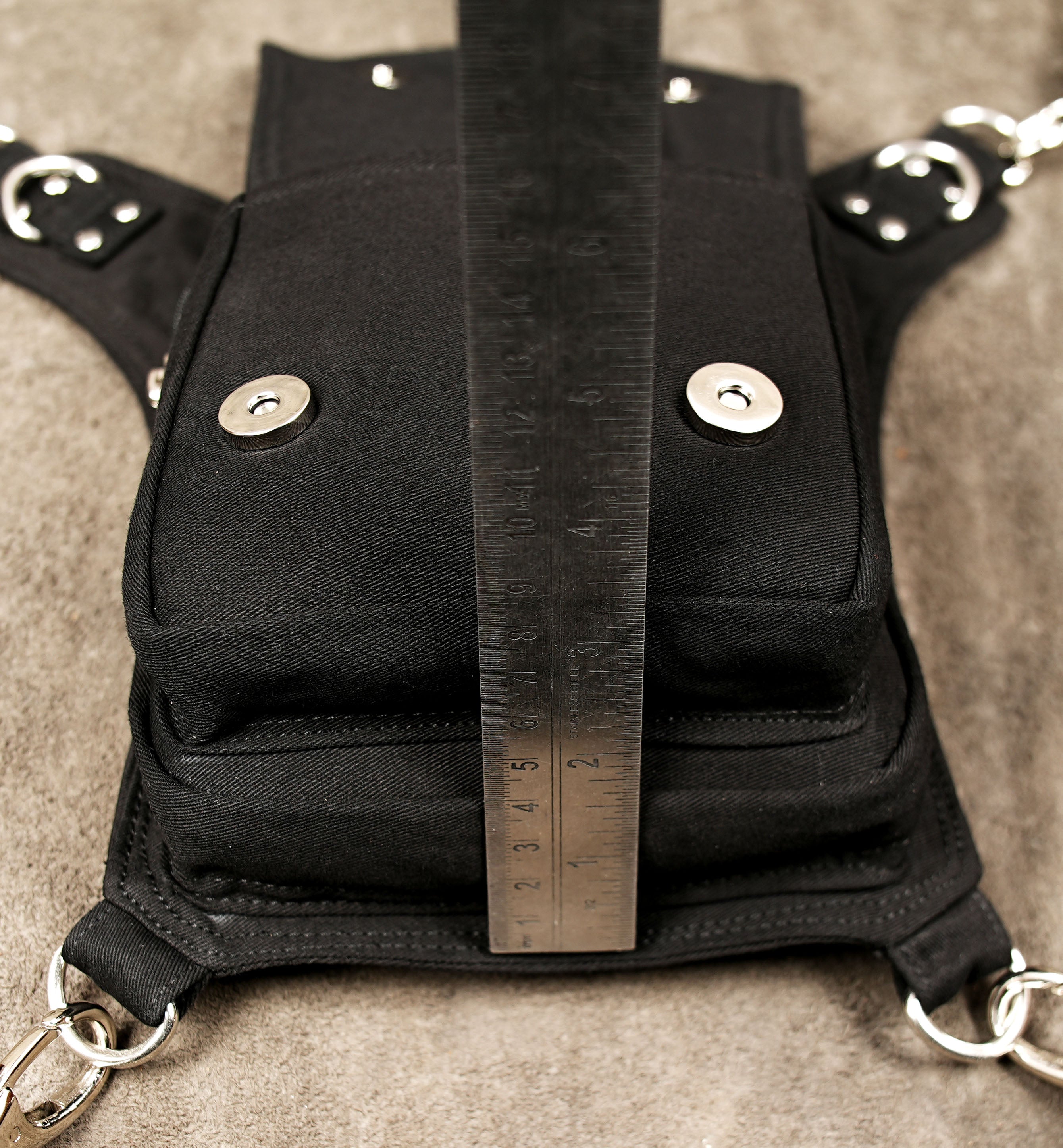 Multi-pocket utility bag with adjustable strap system