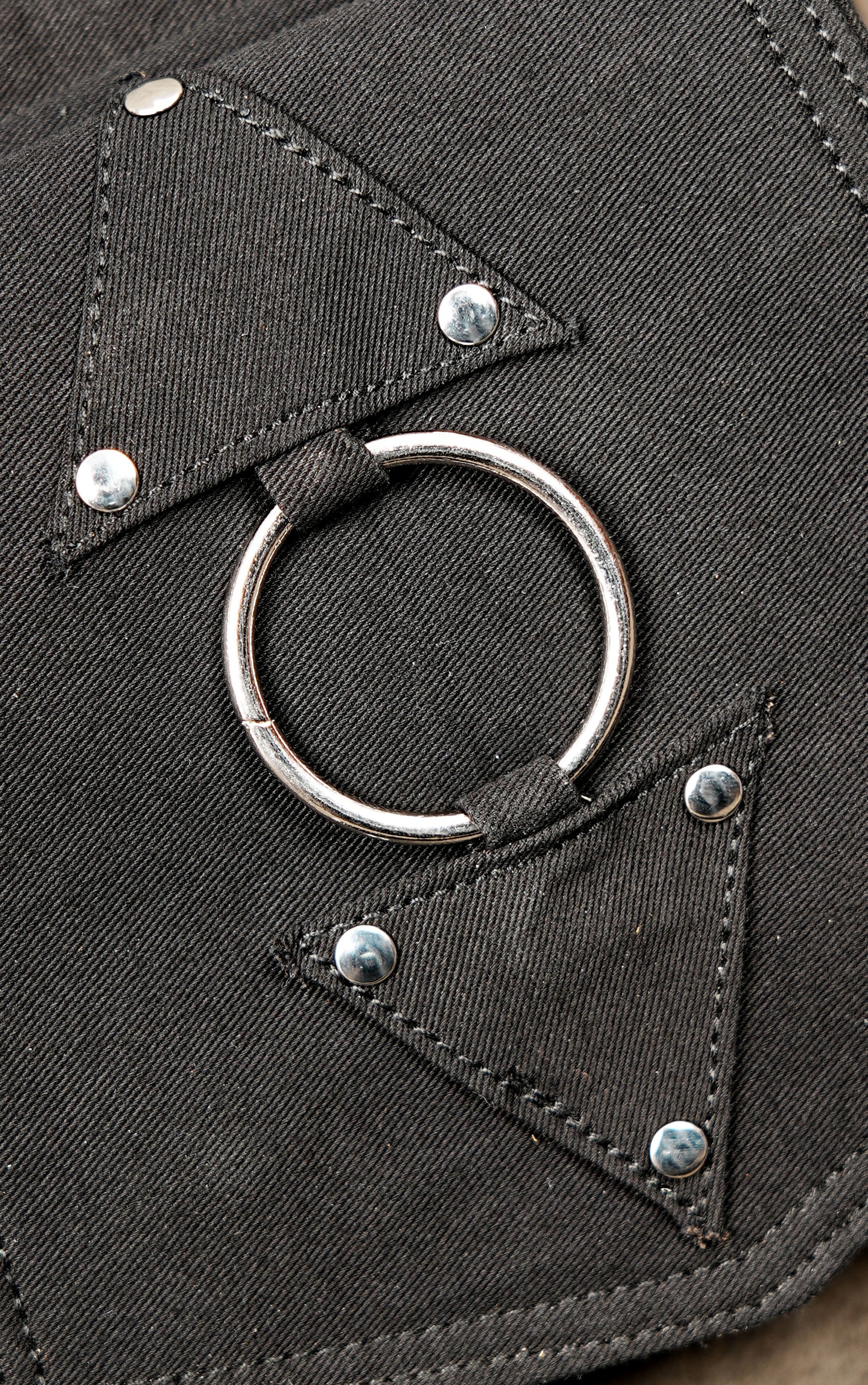 Utility pouch with silver hardware and adjustable buckle straps