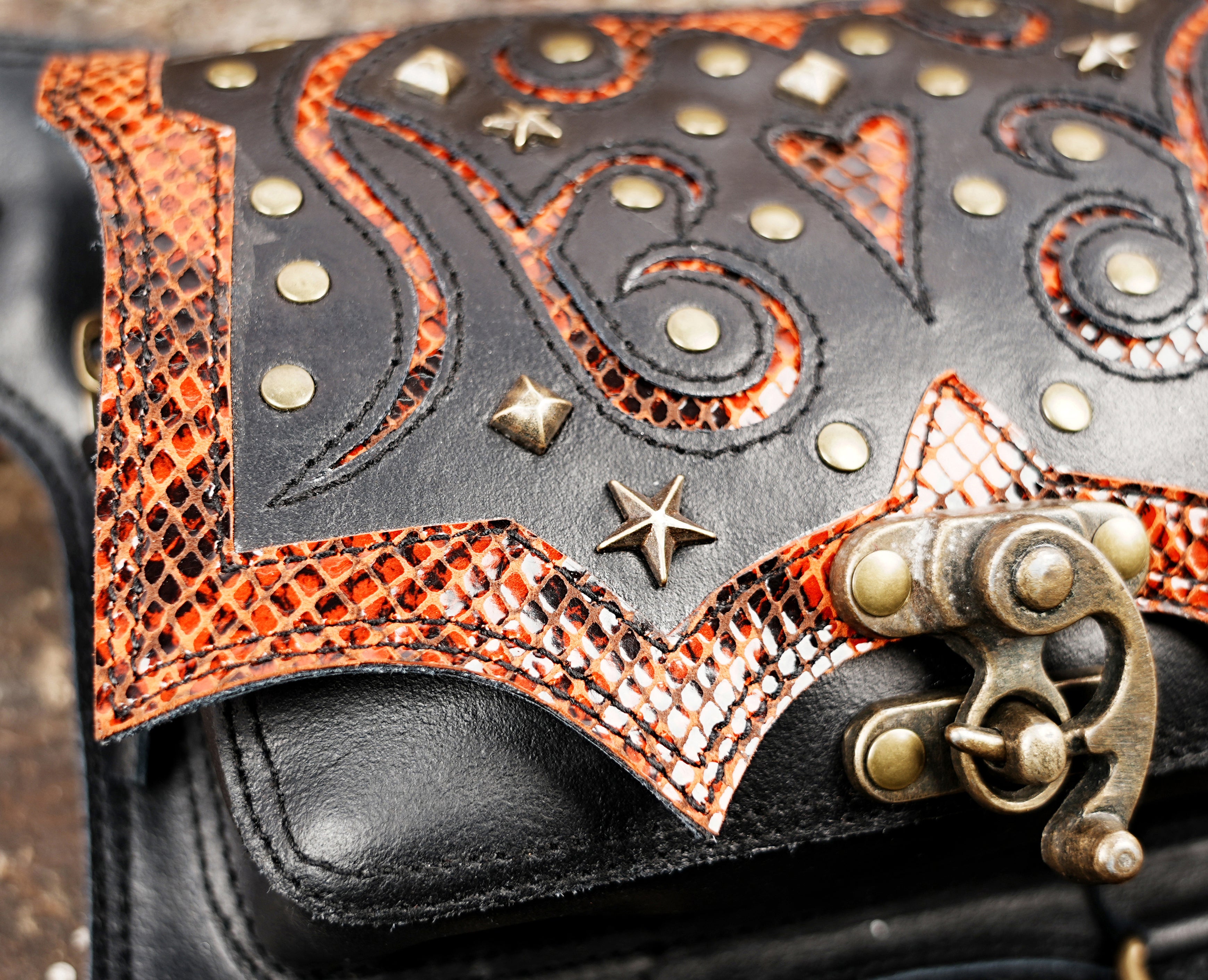 Boho western leather belt with snakeskin texture and decorative stud pattern