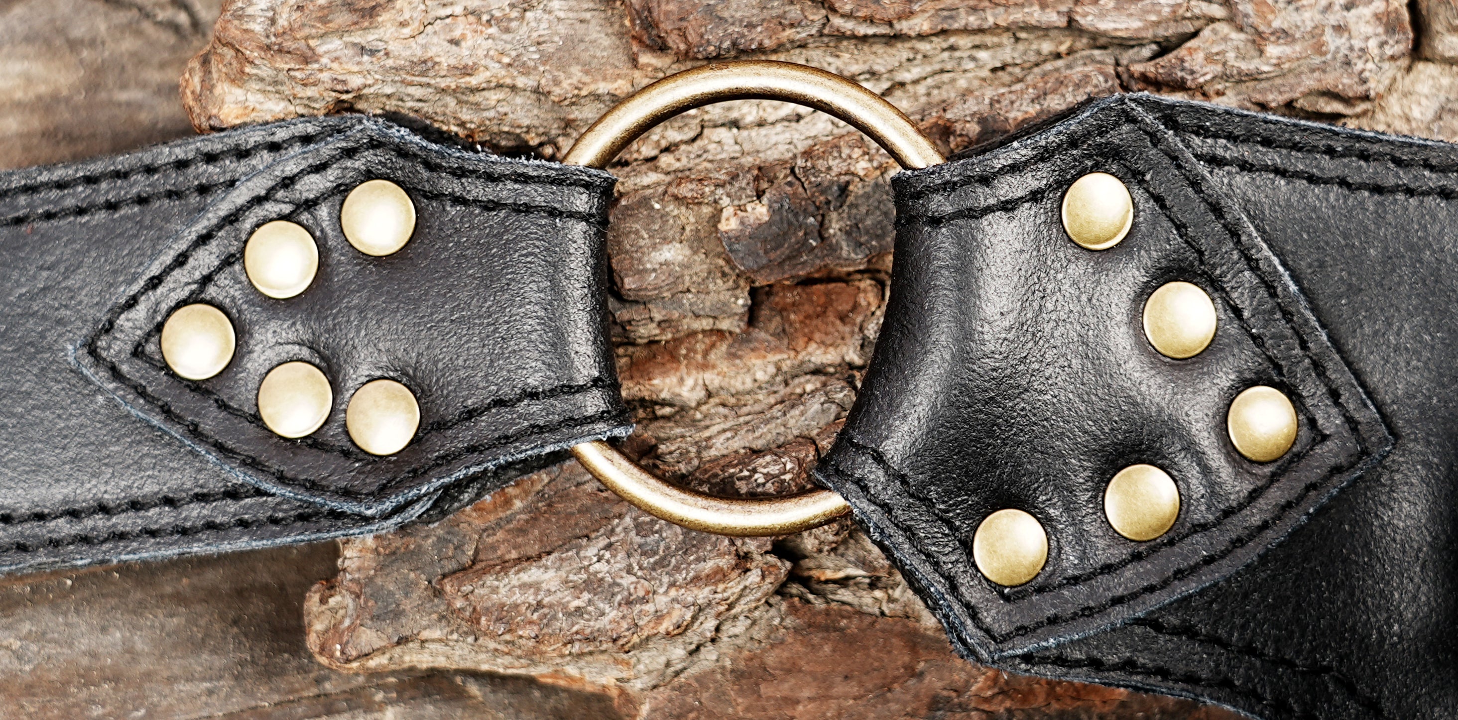 Gypsy style leather waist belt with studded leather and fringe trim