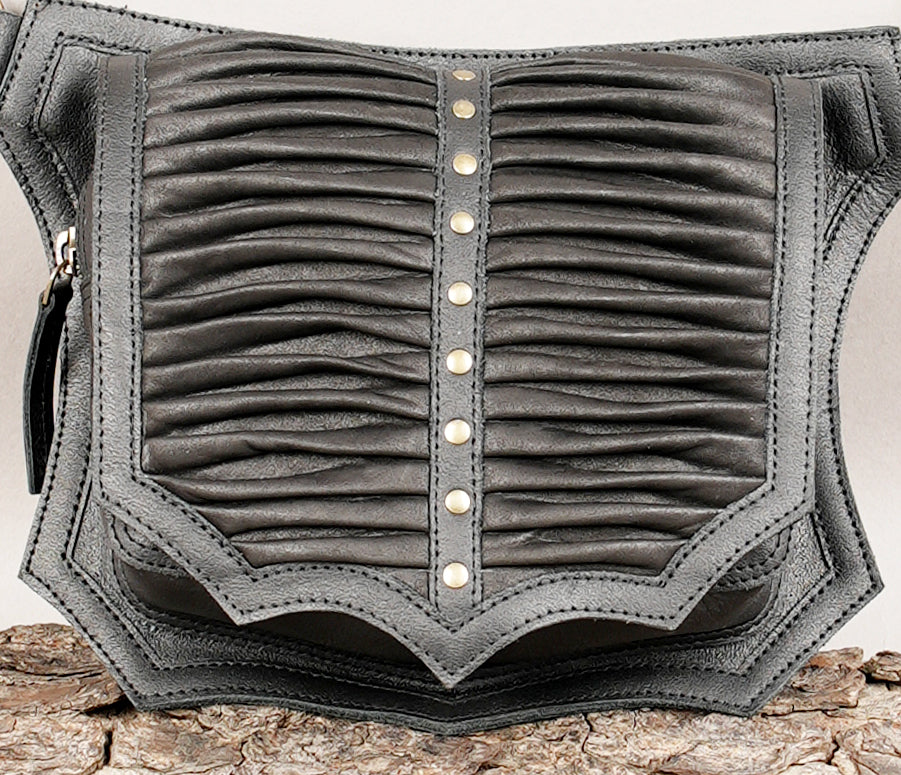 Leather waist belt with front pouch and adjustable strap