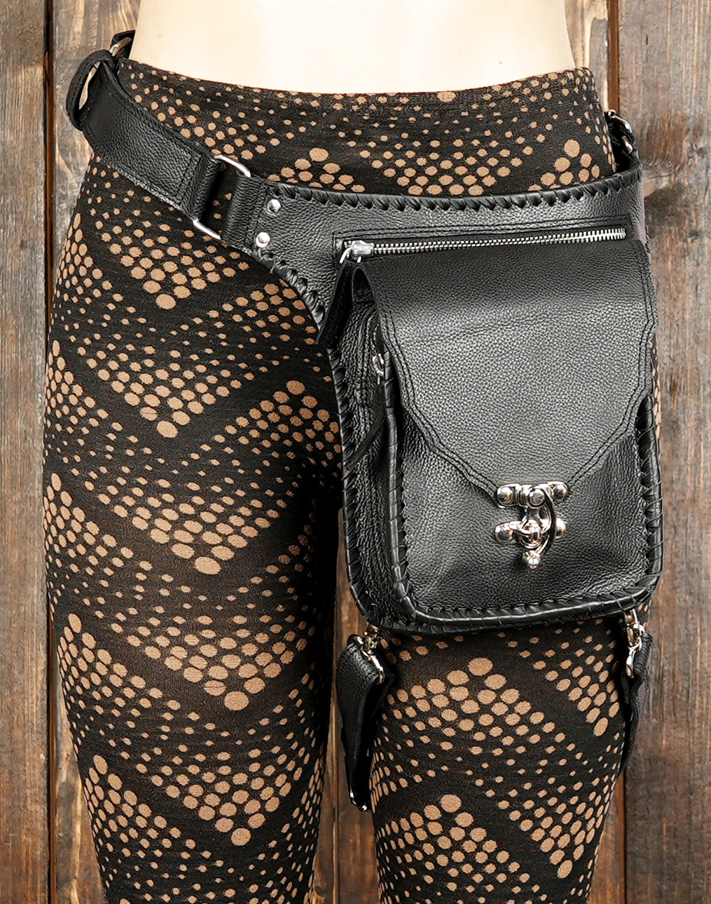 Black thigh bag with adjustable straps for men and women
