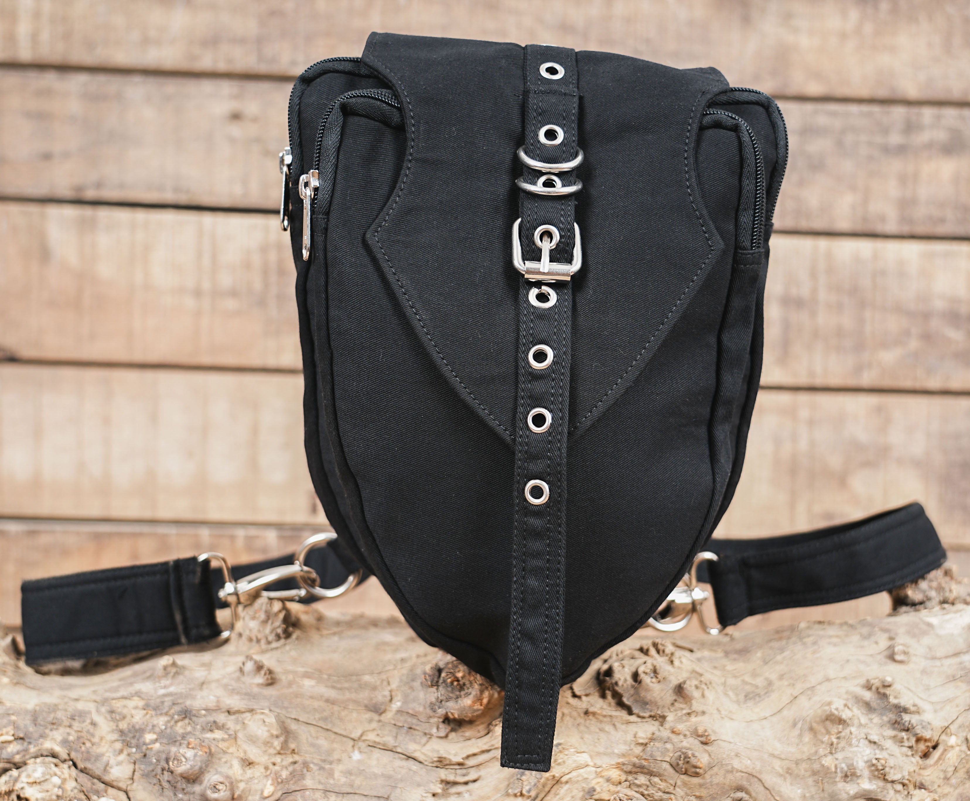 Dark wear aesthetic shoulder holster and waist pack crafted by artisan methods