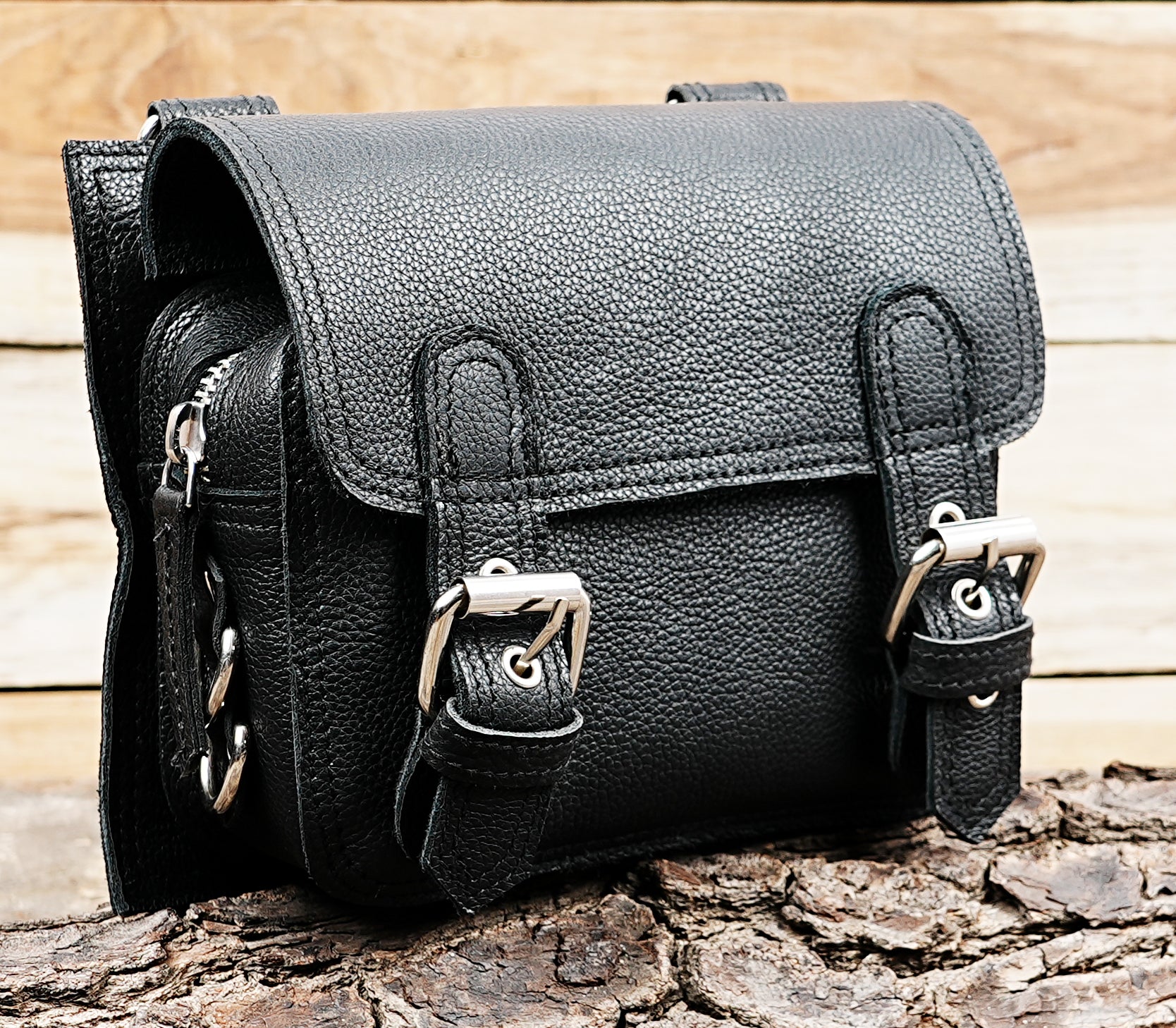 Handcrafted leather hip pouch with metal hardware