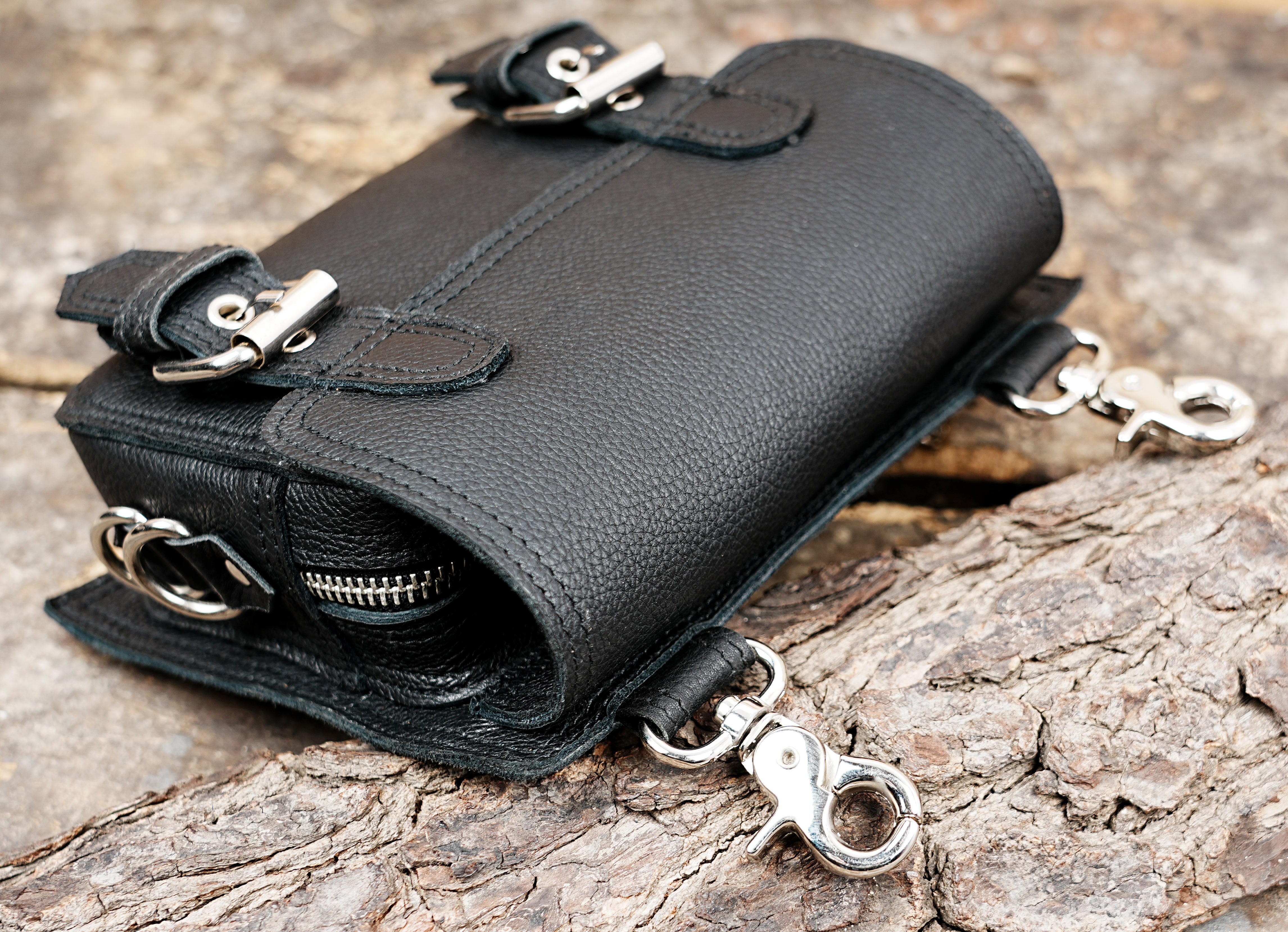 Minimal leather waist pouch with metal clasps