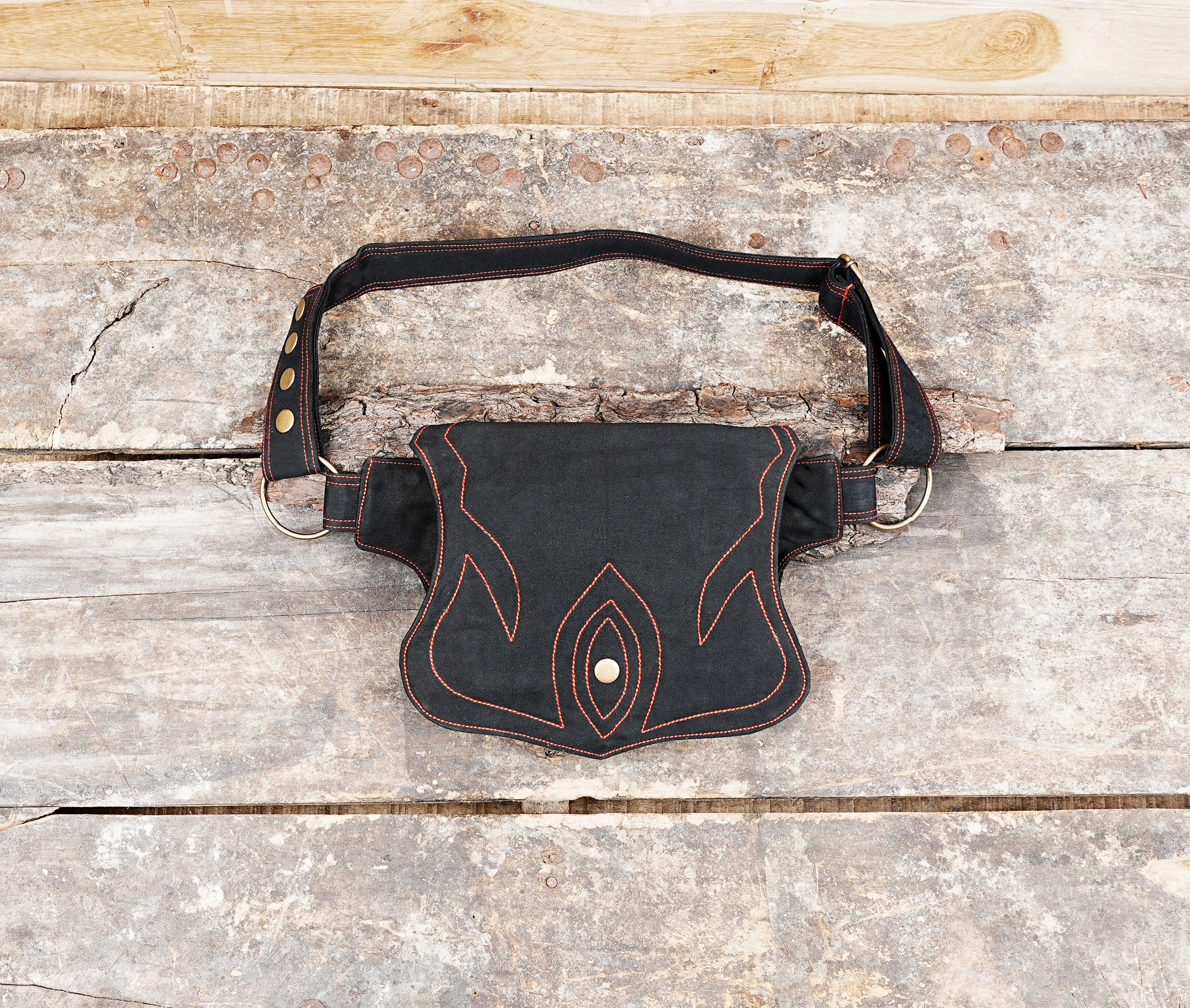 Handcrafted fanny pack with brass snaps and orange contrast stitching