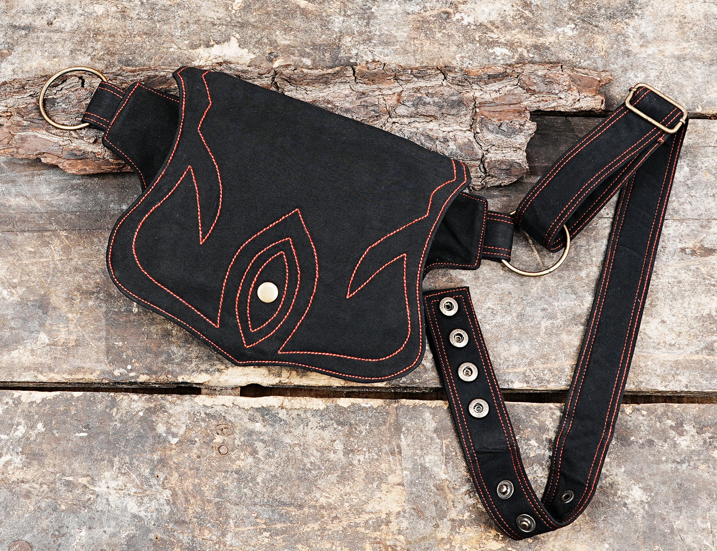 Black utility waist bag with fire pattern stitching, festival and travel accessory