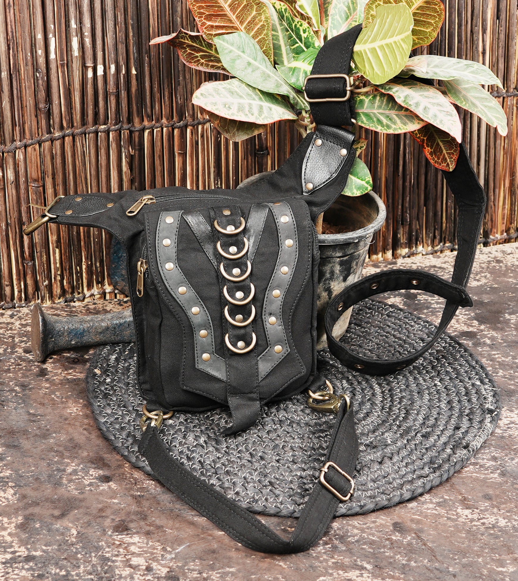 Handmade cotton crossbody bag with decorative brass accents