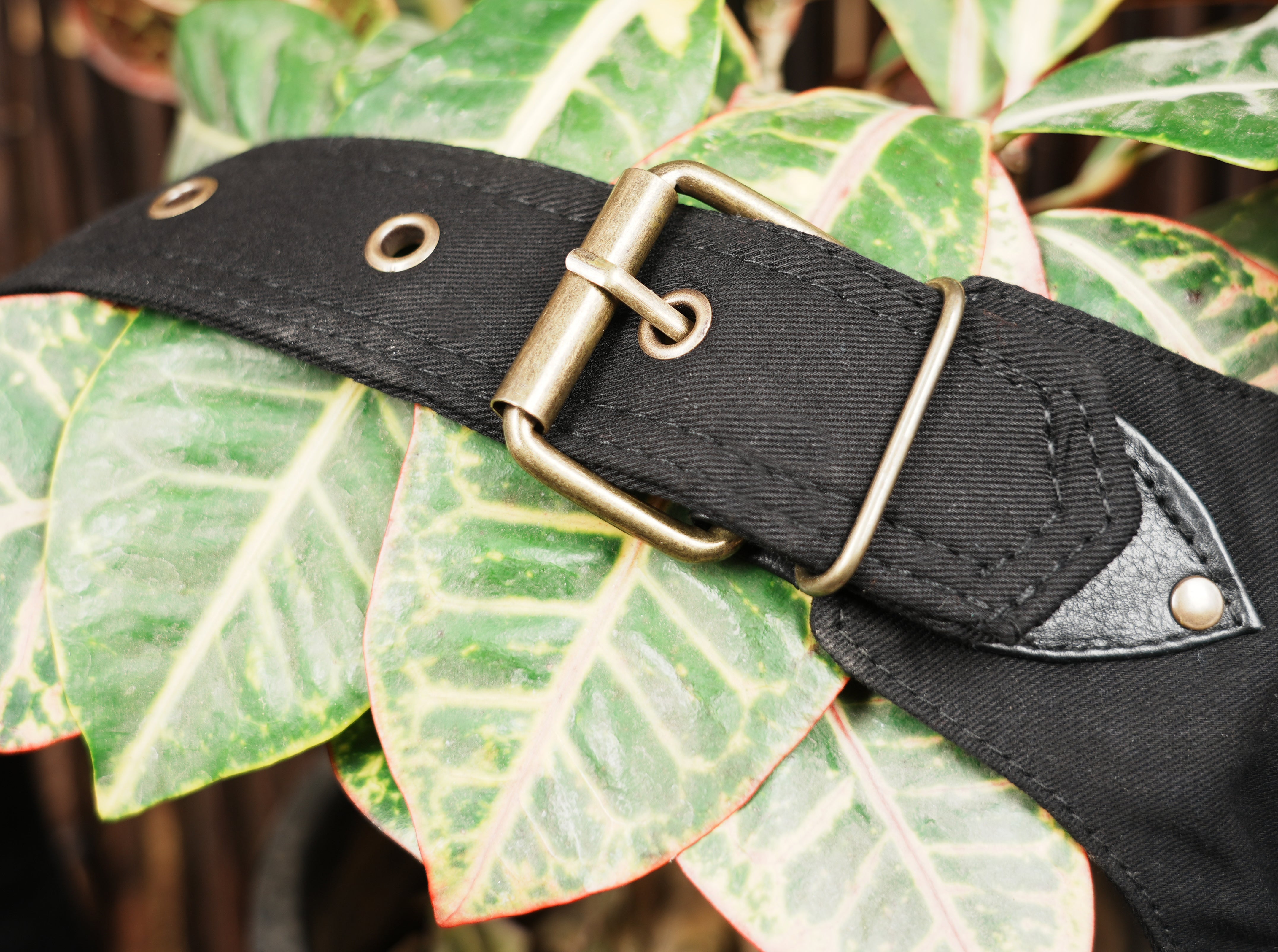 Black cotton carry pouch with functional festival design