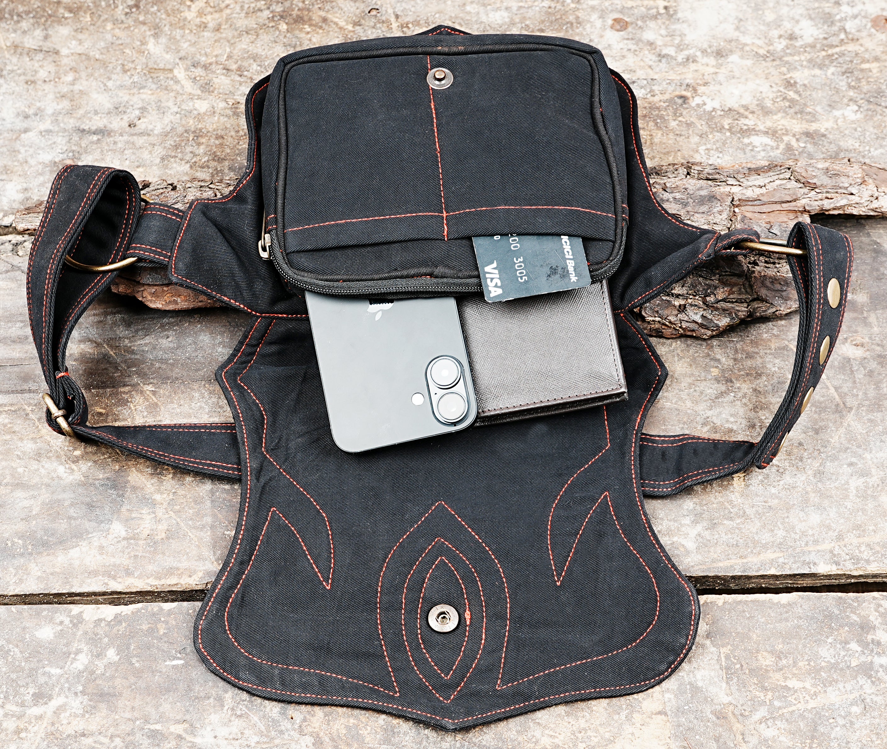 Men's and women's waist bag with brass D-ring straps and snap closure