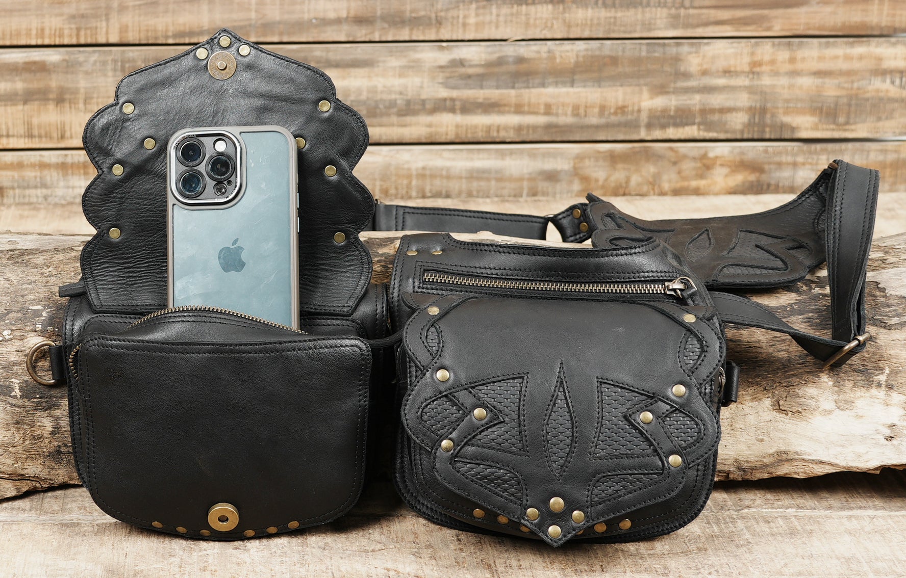 Steampunk style leather holster with decorative rivets and tribal patterns