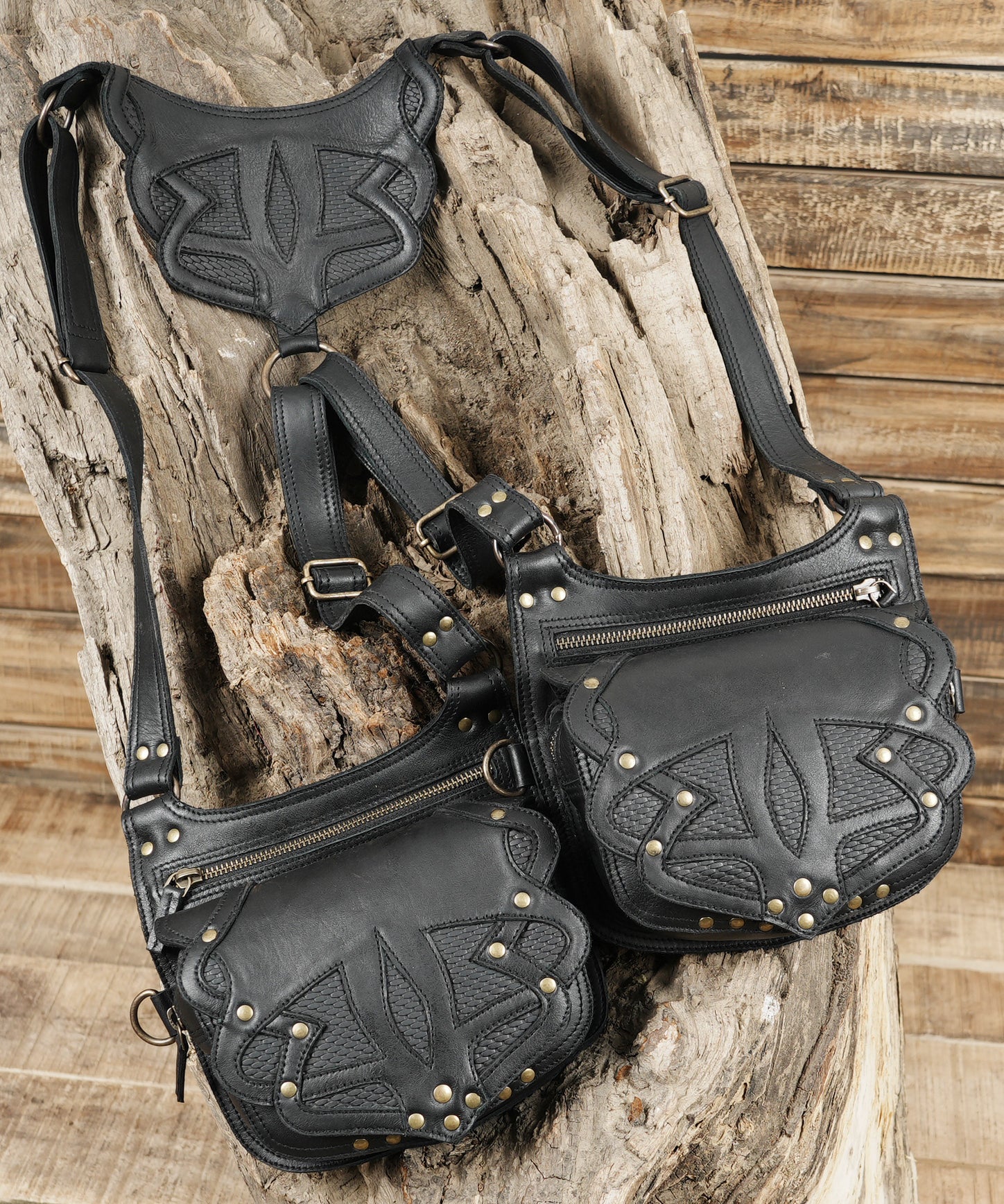 Tactical style leather holster with twin pouches and secure straps