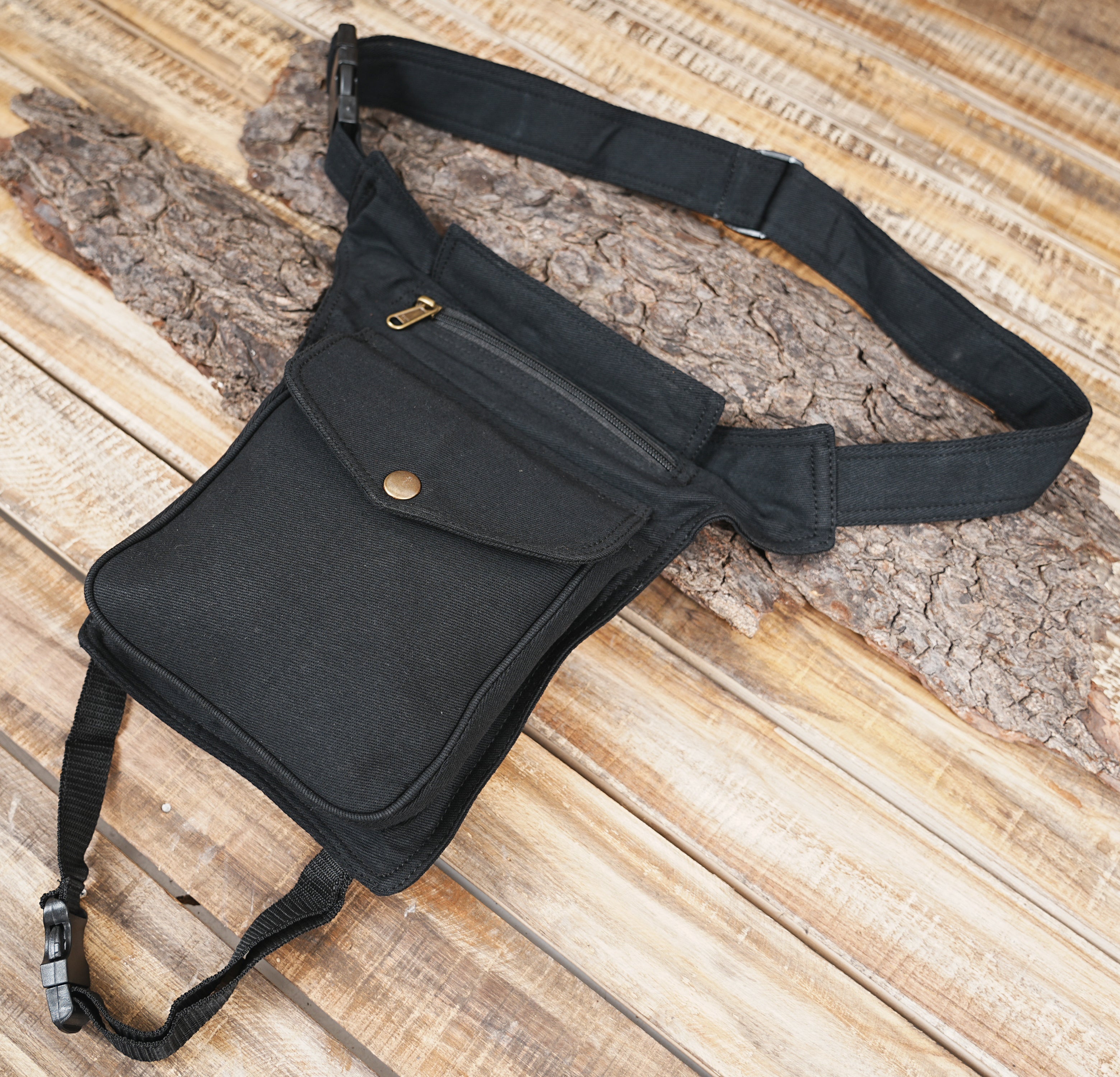 Black utility bag with waist belt and leg strap