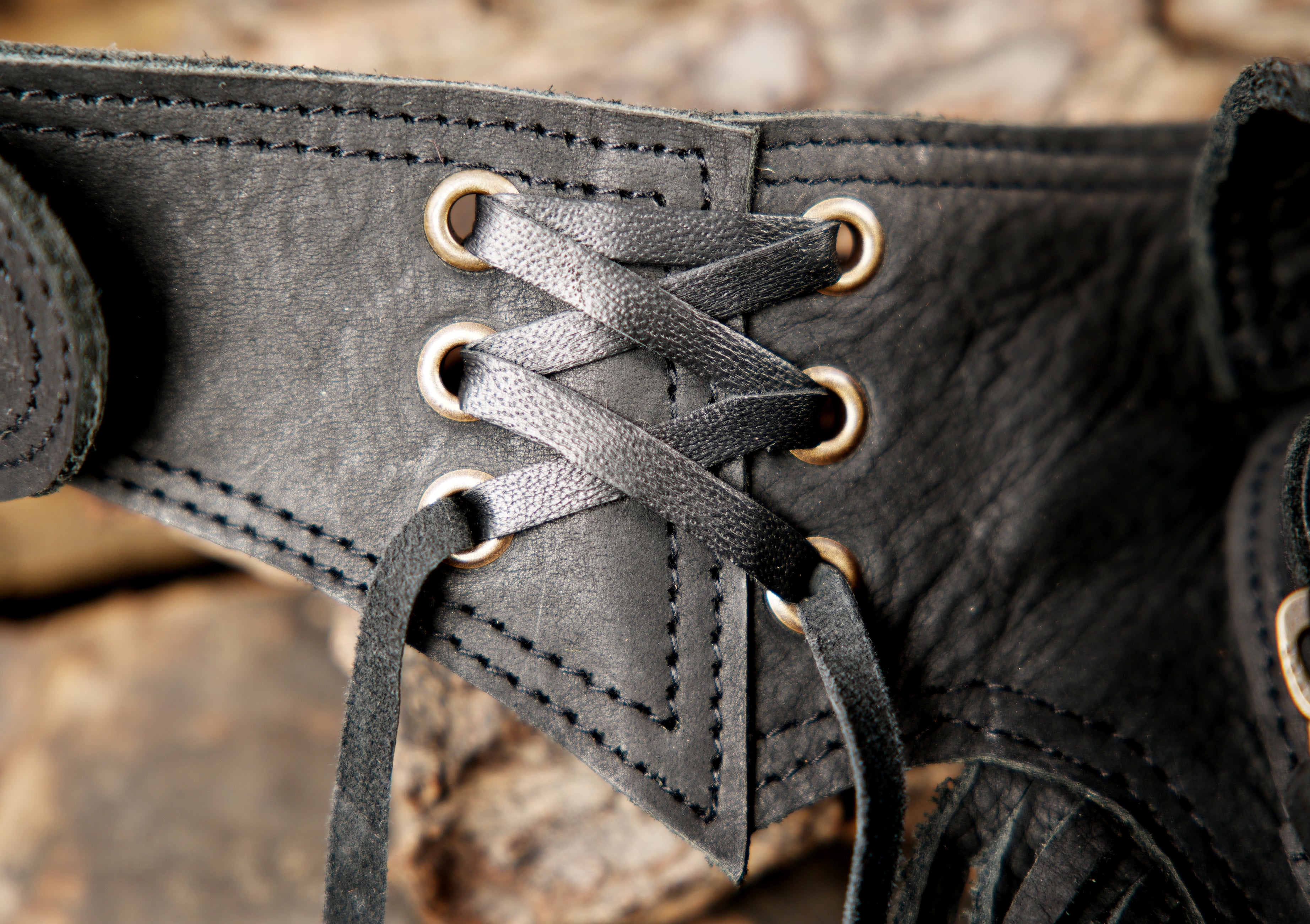 Black leather thigh belt with braided stone setting