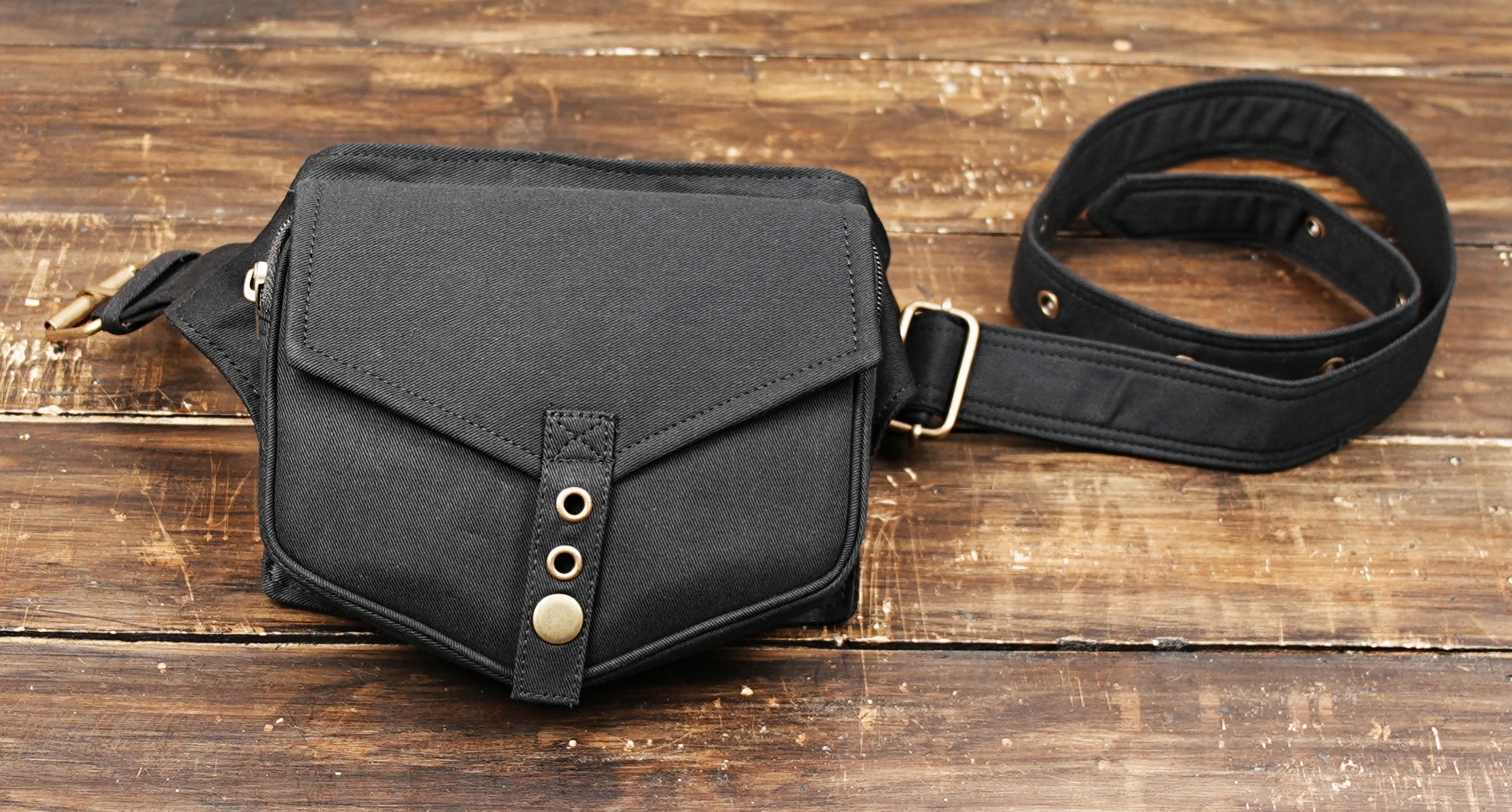 Minimalist black waist pouch for travel, hiking and daily use