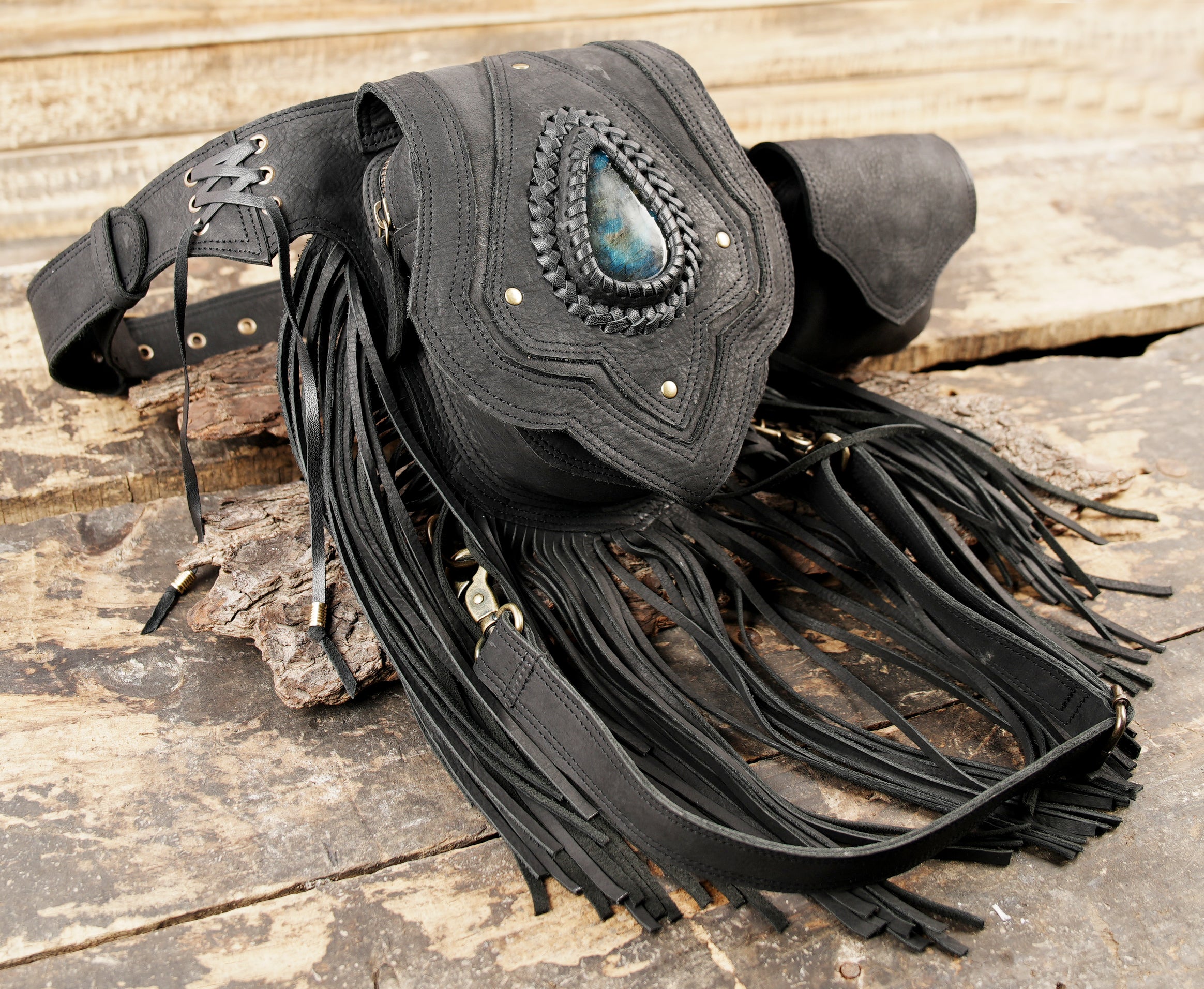 Leather thigh holster bag with fringe and decorative stone