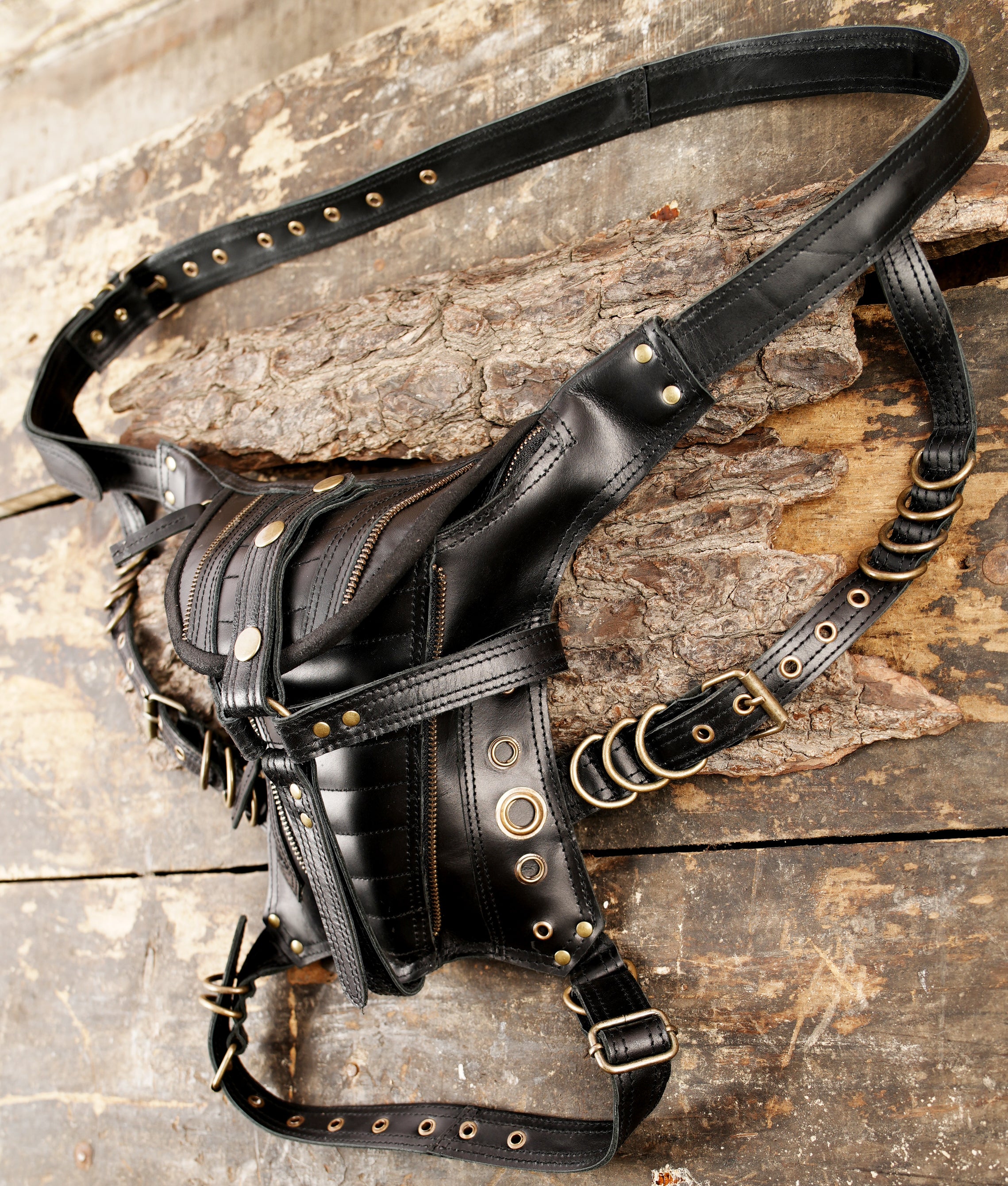 Black leather thigh utility belt with zipper accents