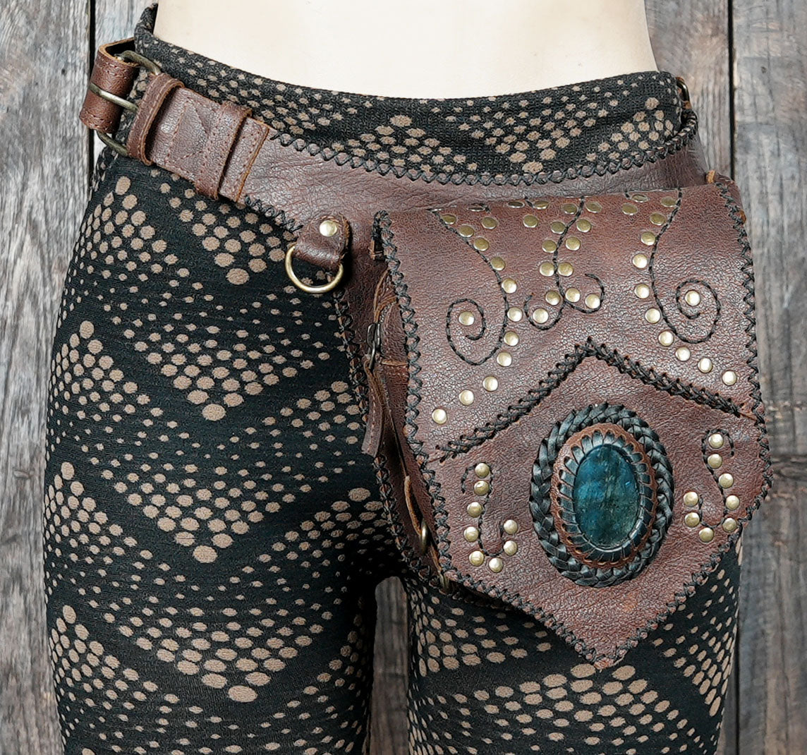 Handcrafted leather waist belt with decorative metal studs