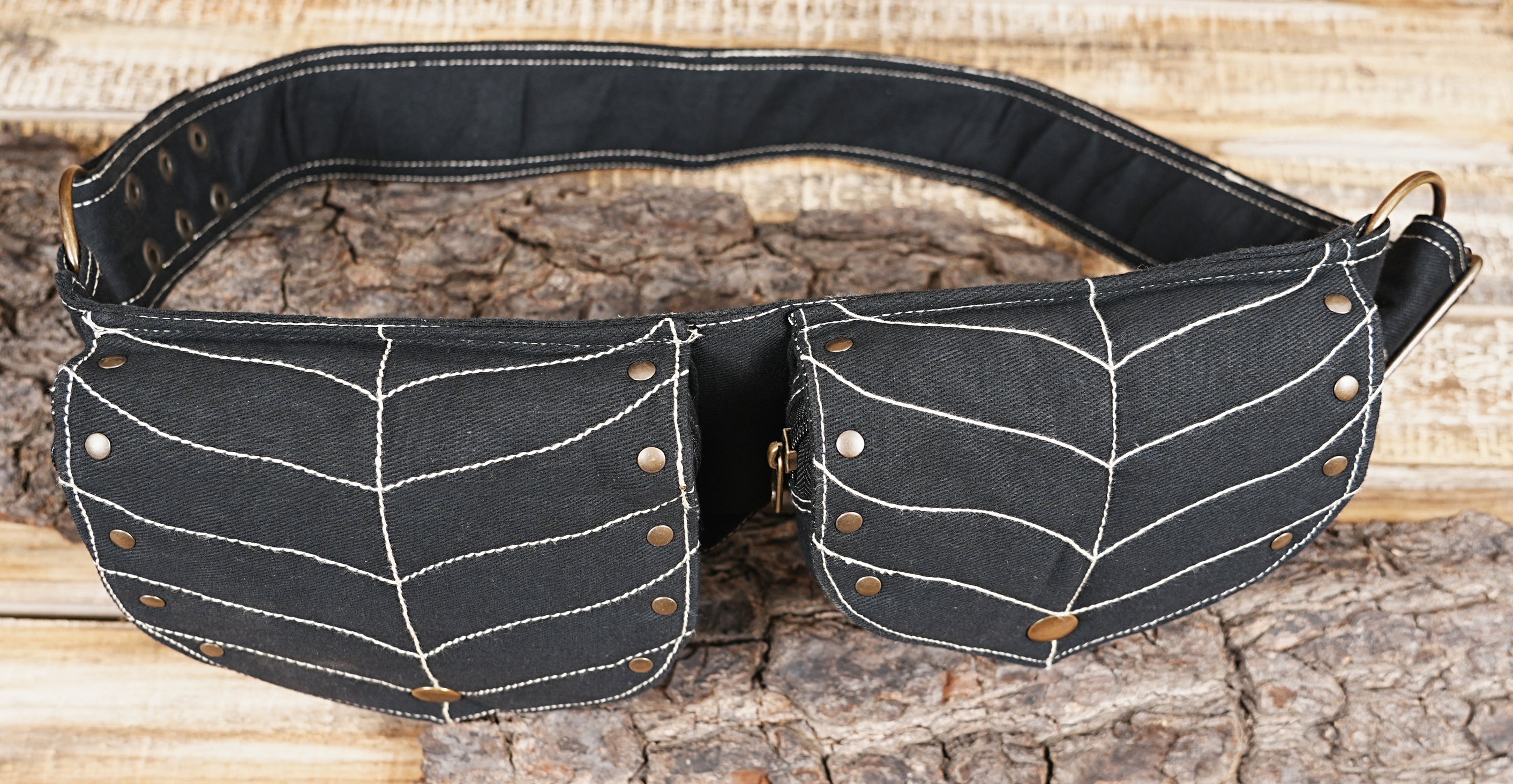Handcrafted black canvas pocket belt with a nature-inspired design