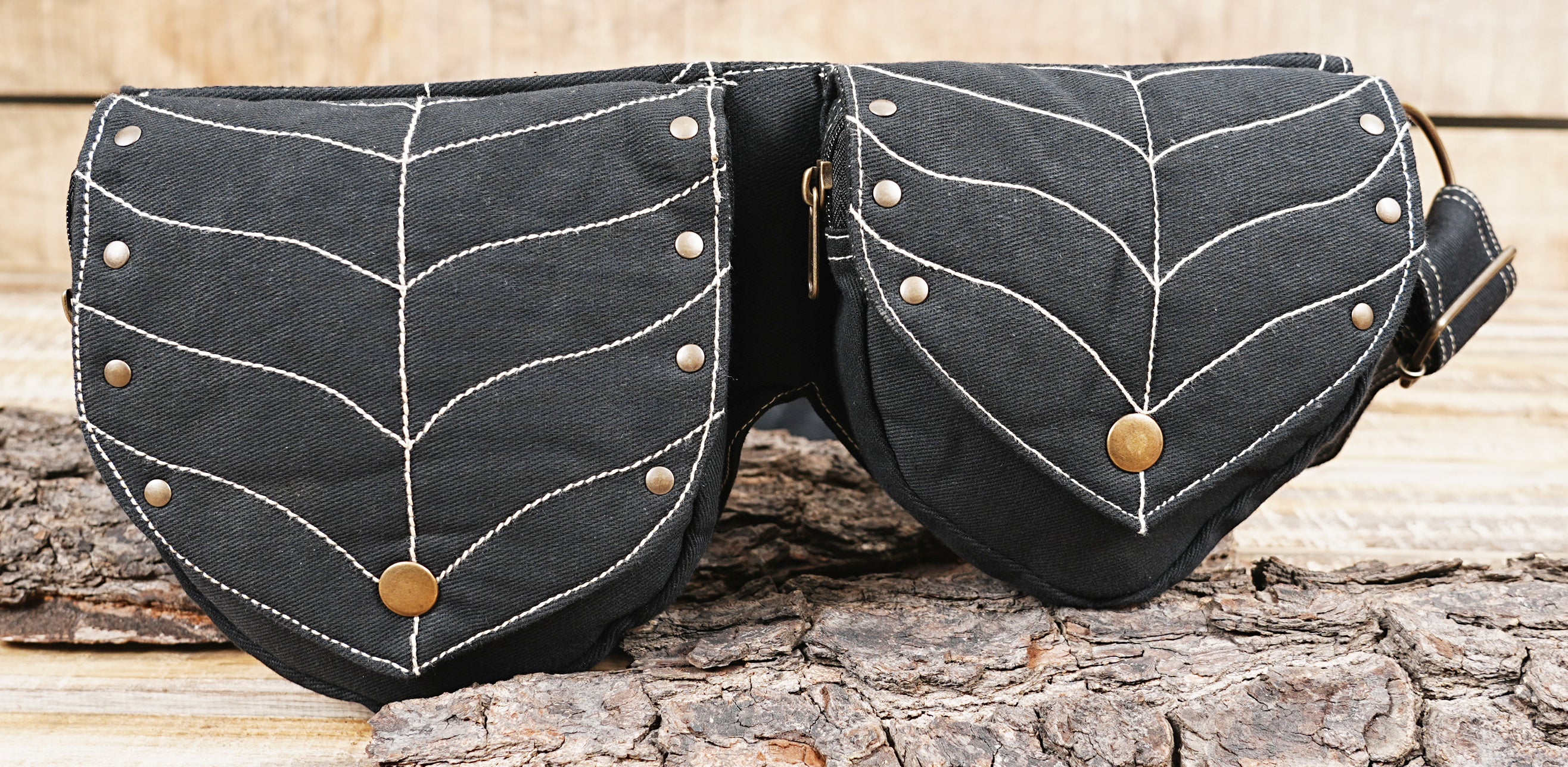 Handcrafted cotton canvas hip pouch in rich black with artisanal leaf pattern