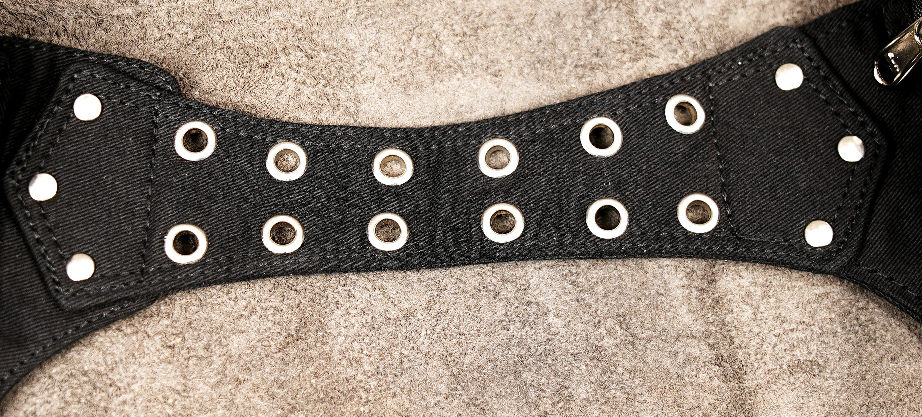 Rugged black multi-pocket pouch belt suitable for festivals and travel.