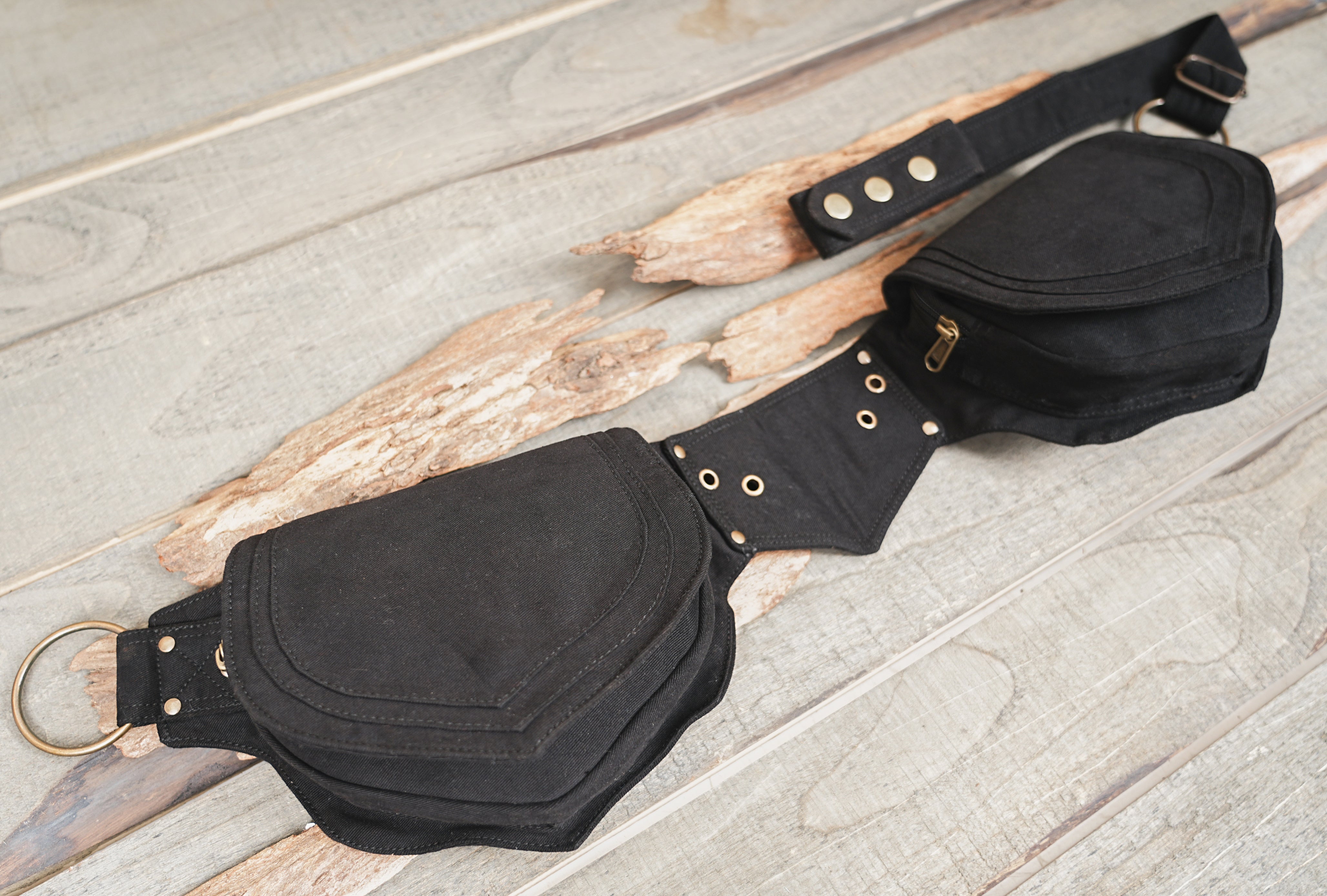 Adjustable waist belt with brass snap closure