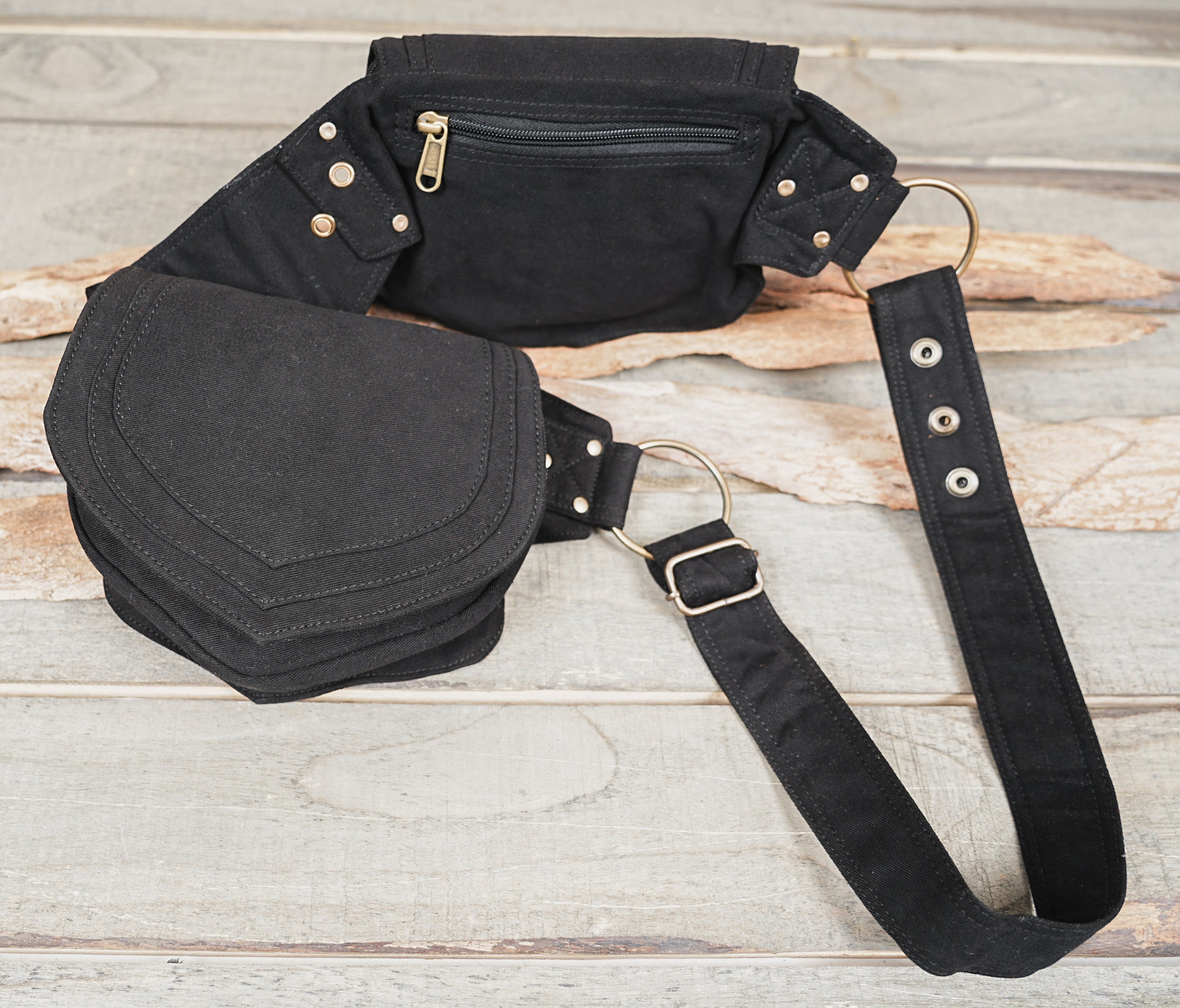 Black hip pouch with rounded layered pocket design