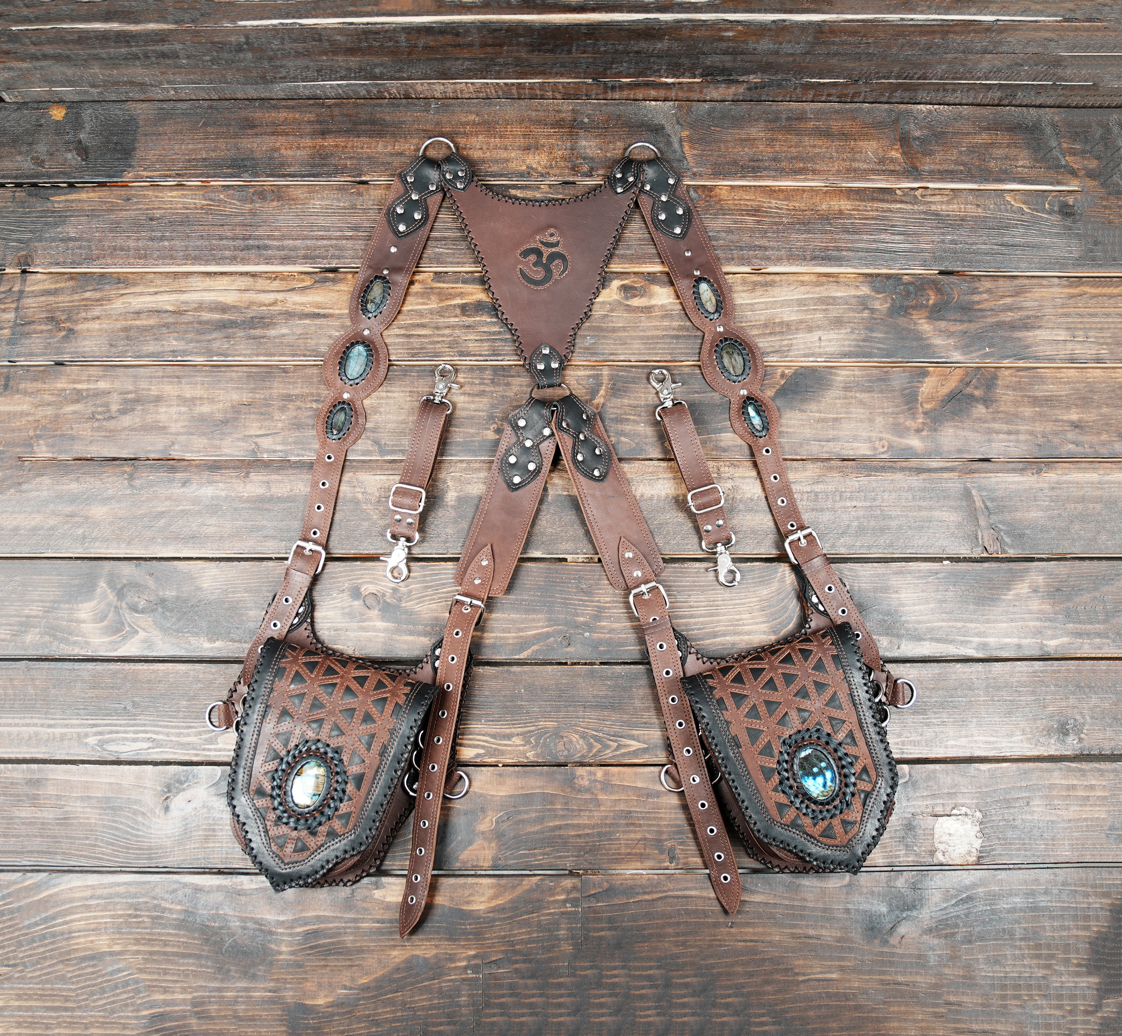 Handmade brown leather double thigh holster with adjustable straps and stone detail
