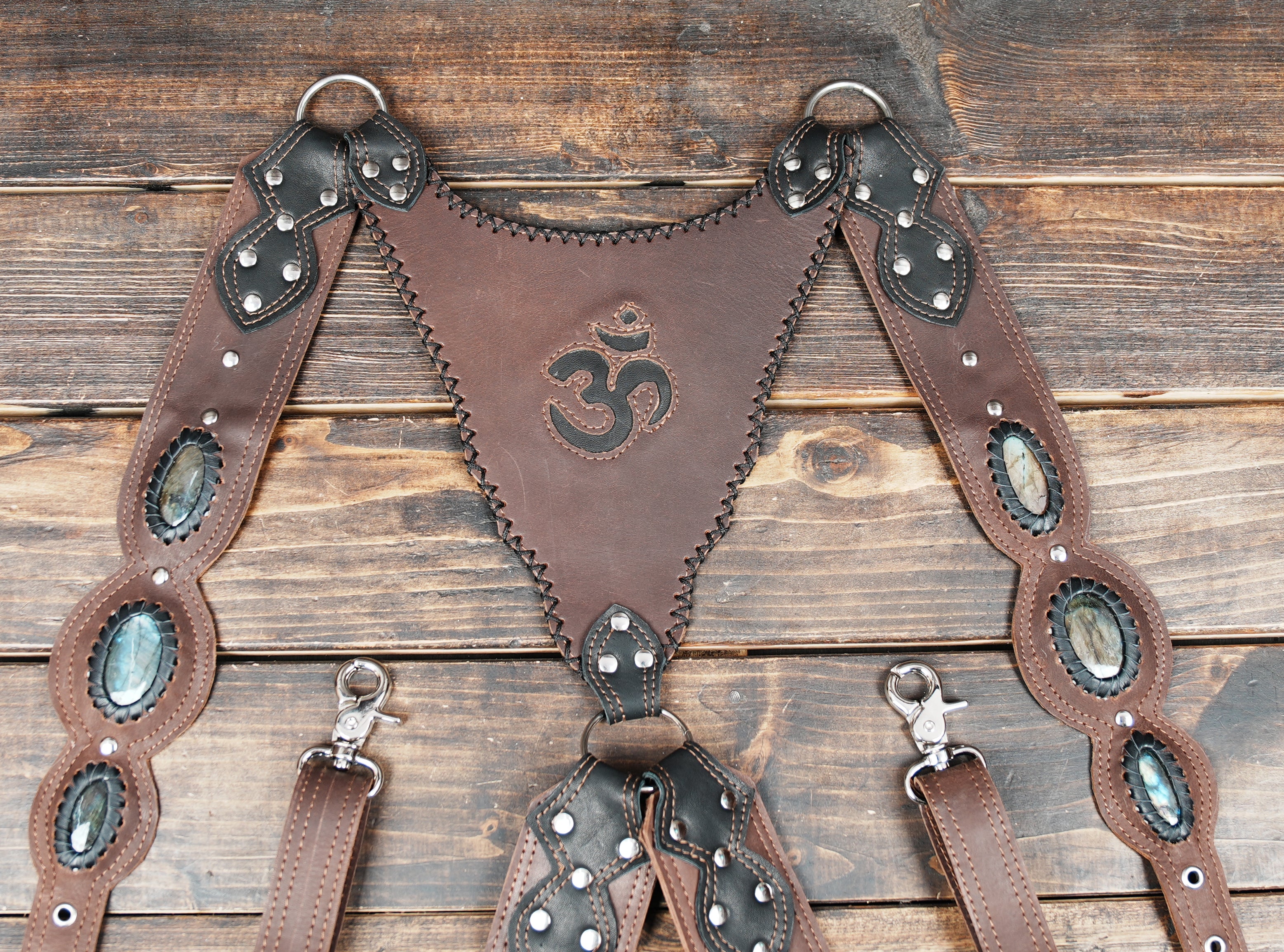 Genuine leather waist and leg holster with tribal carved pattern and metal hardware