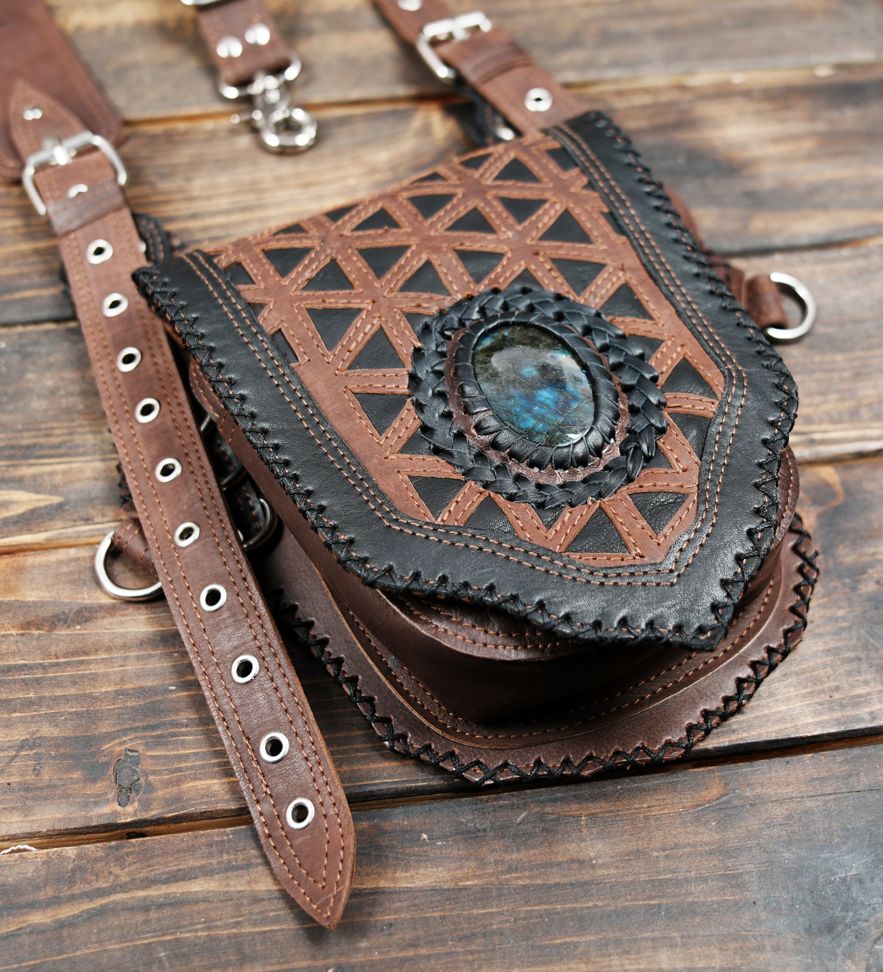 Boho style leather thigh holster bag with geometric cutwork and gemstone accent