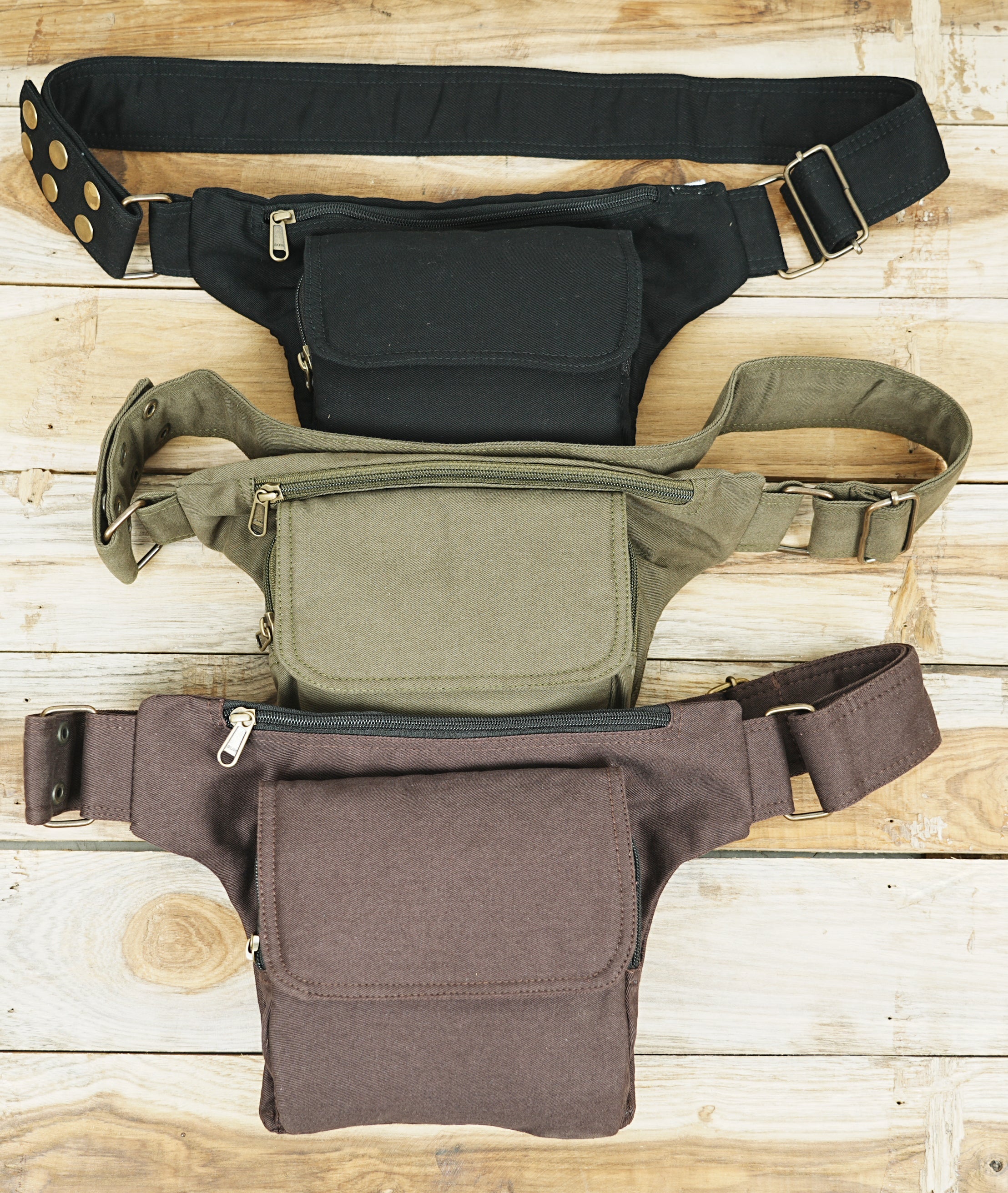 Black cotton hip bag with a front flap pocket