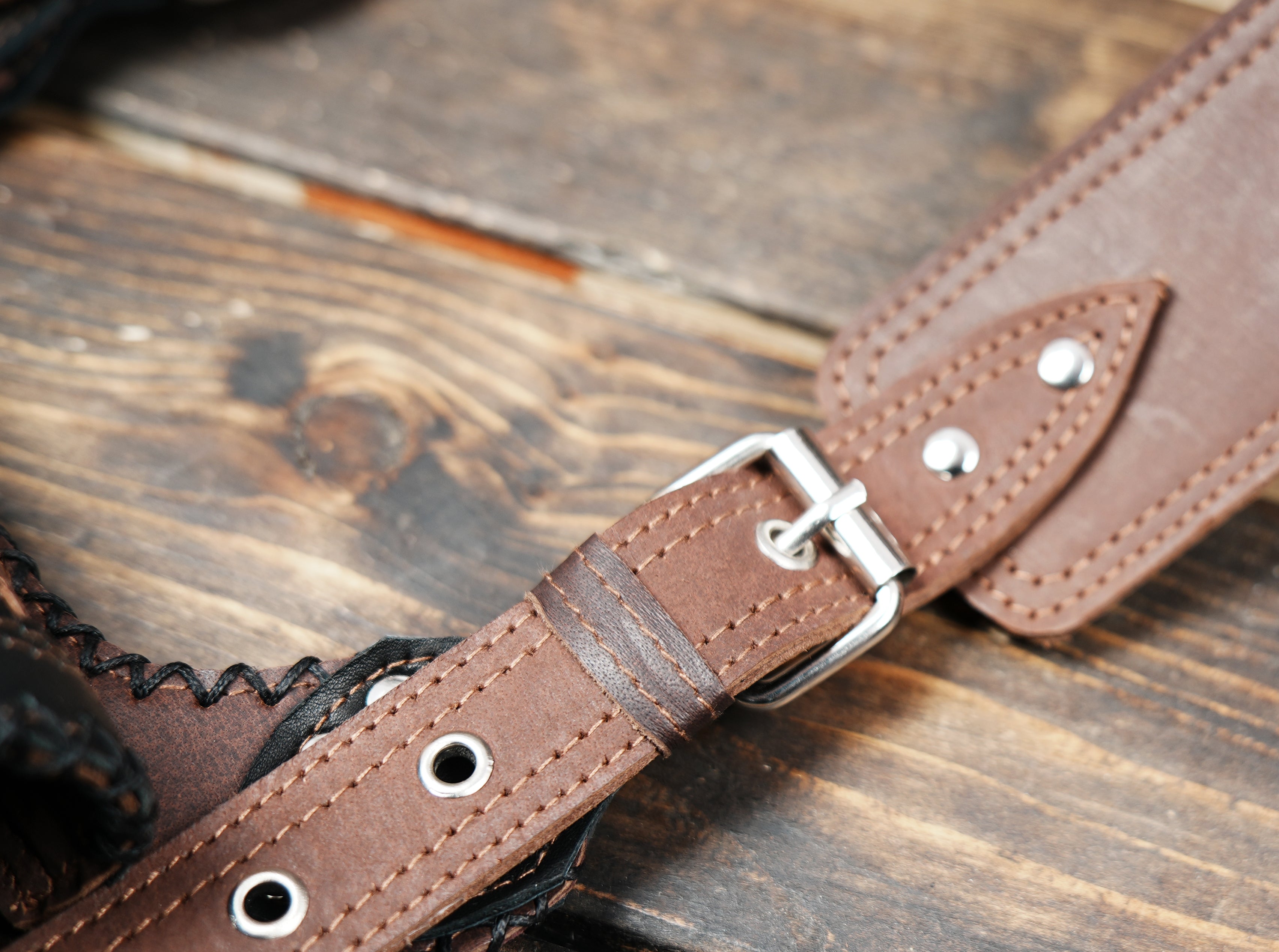 Steampunk inspired leather waist thigh holster with metal rings and straps