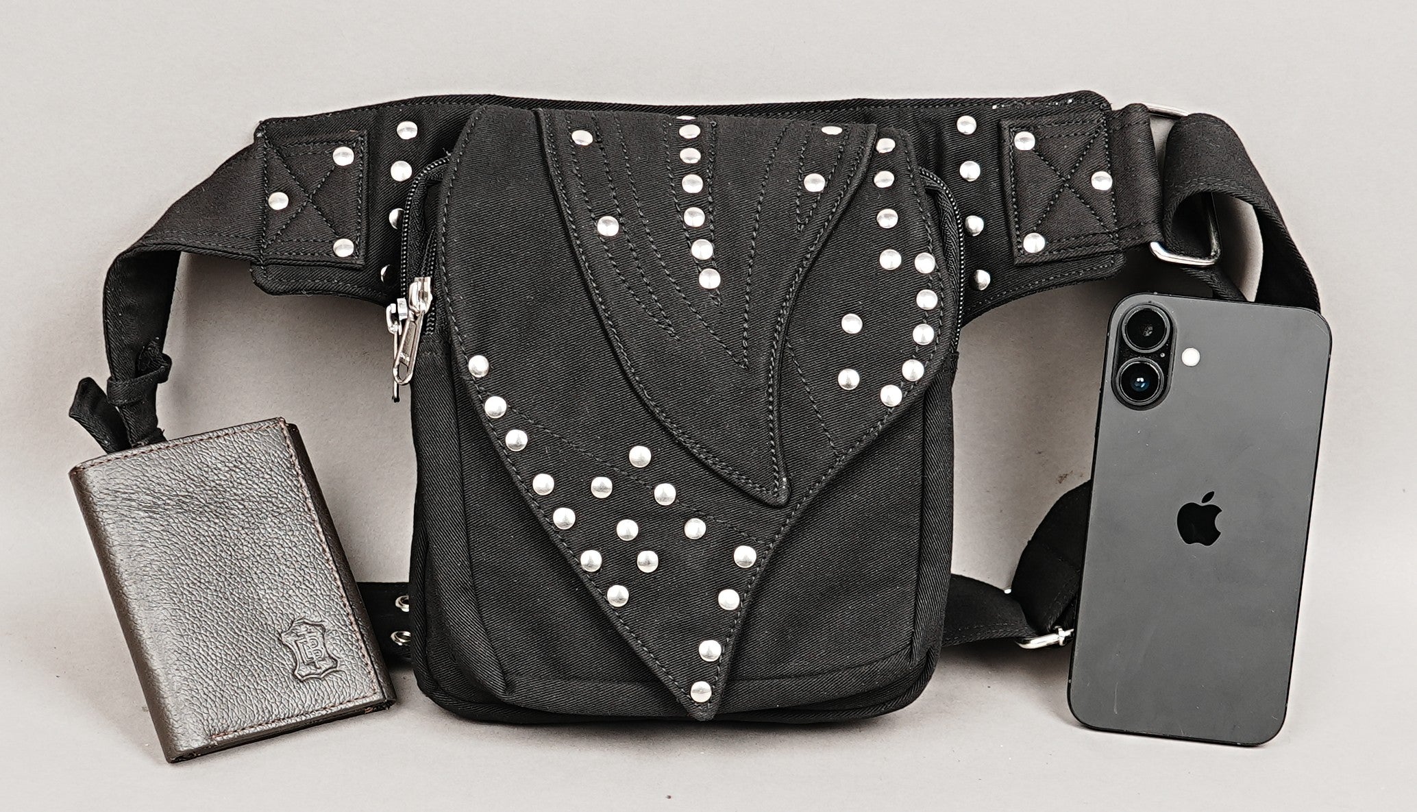 Gothic-inspired utility bumbag fanny pack with studded accents and romantic lace panels.