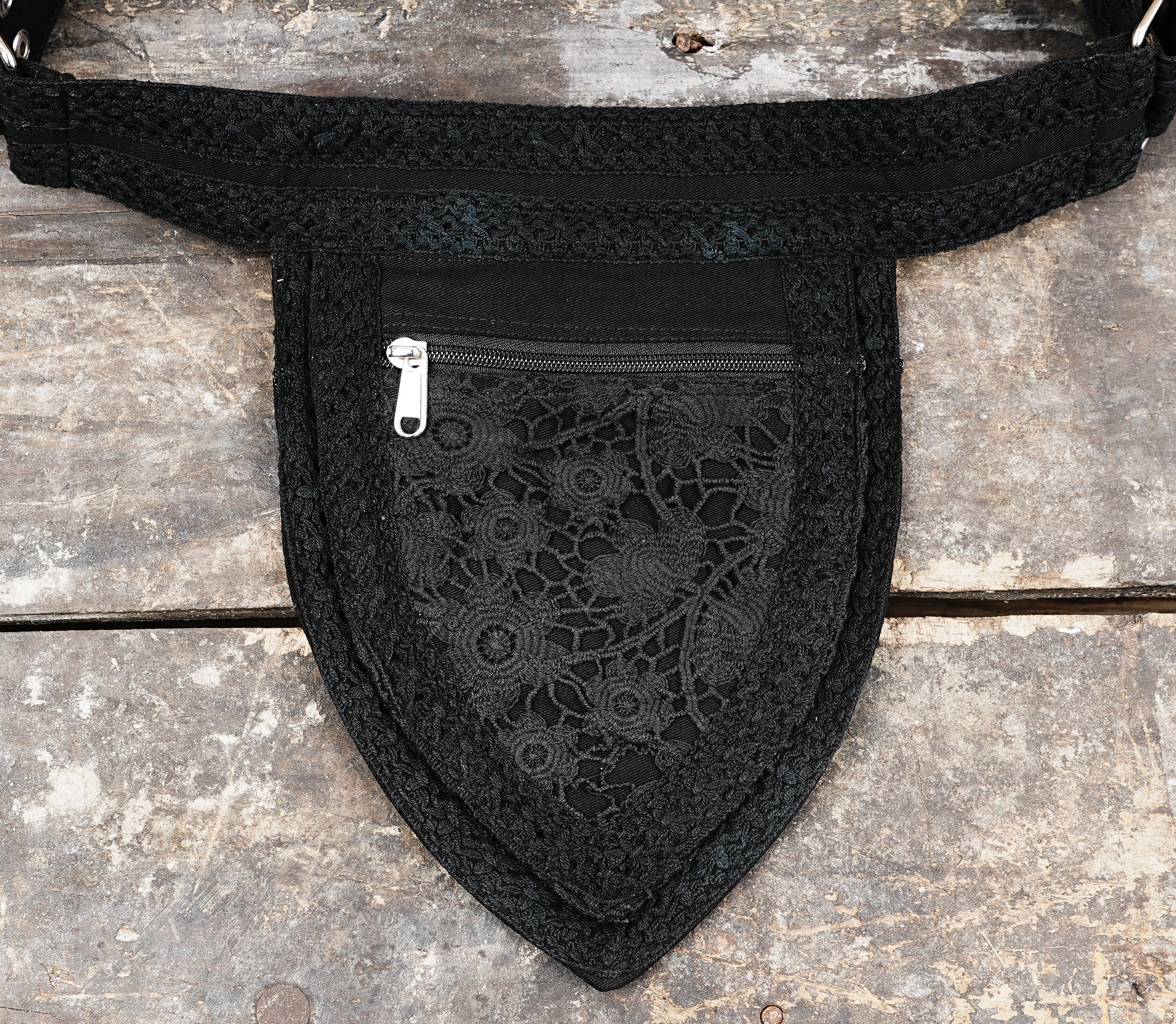 Bohemian festival hip bag made from black cotton canvas with a feminine lace accent.