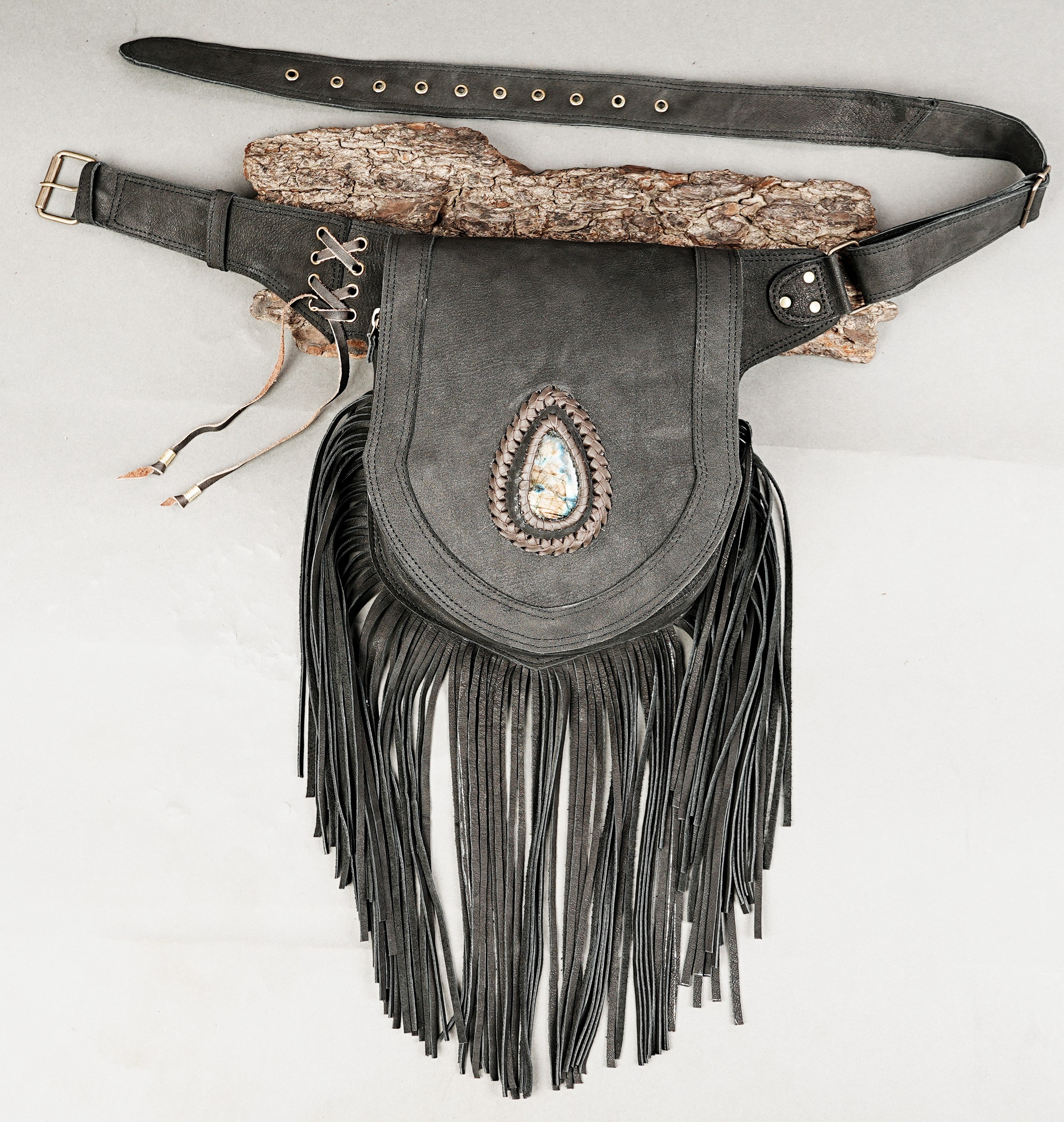 Black leather waist belt bag with fringe and gemstone detail