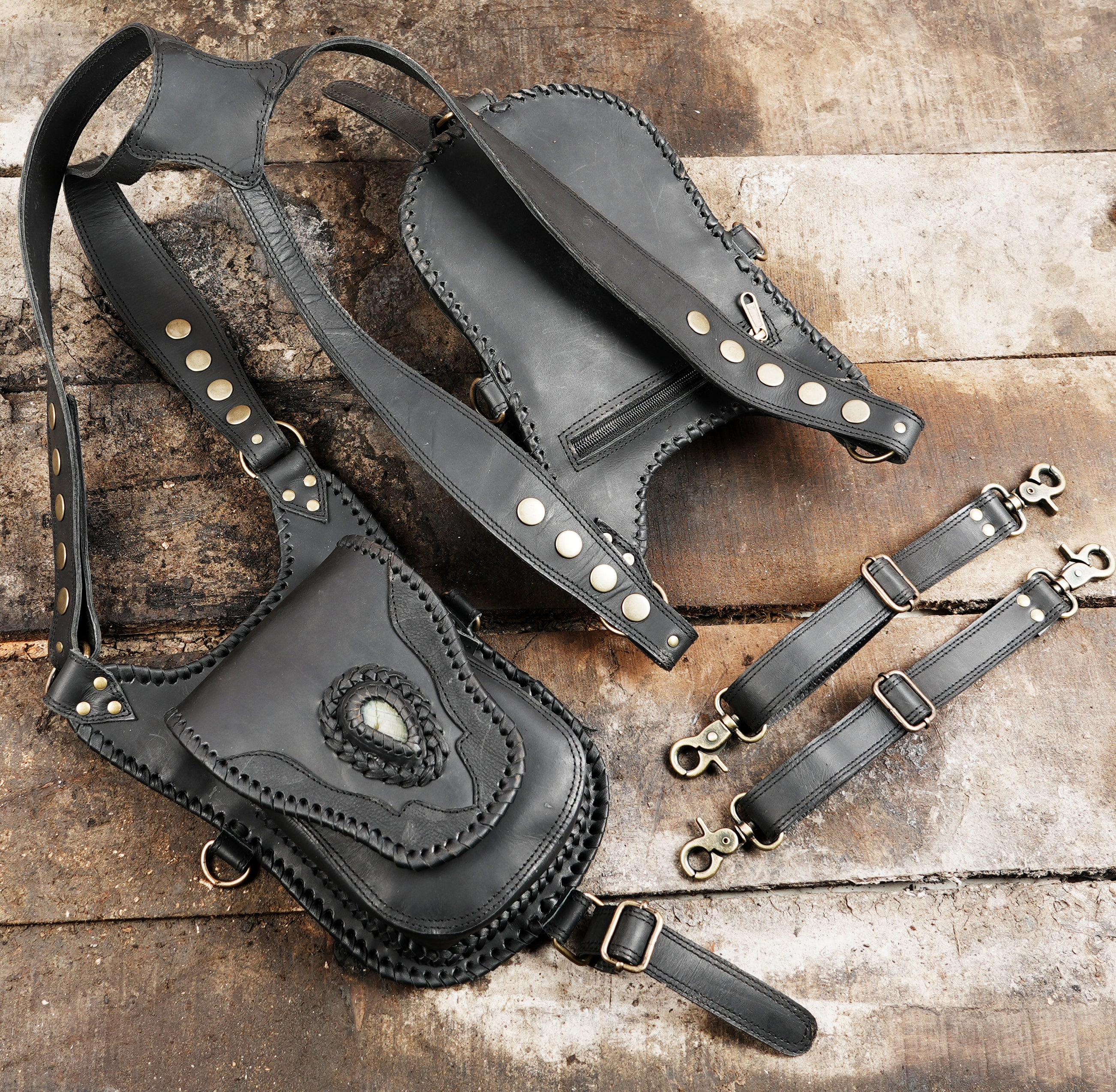 "Leather shoulder harness bag with handcrafted pouch design"