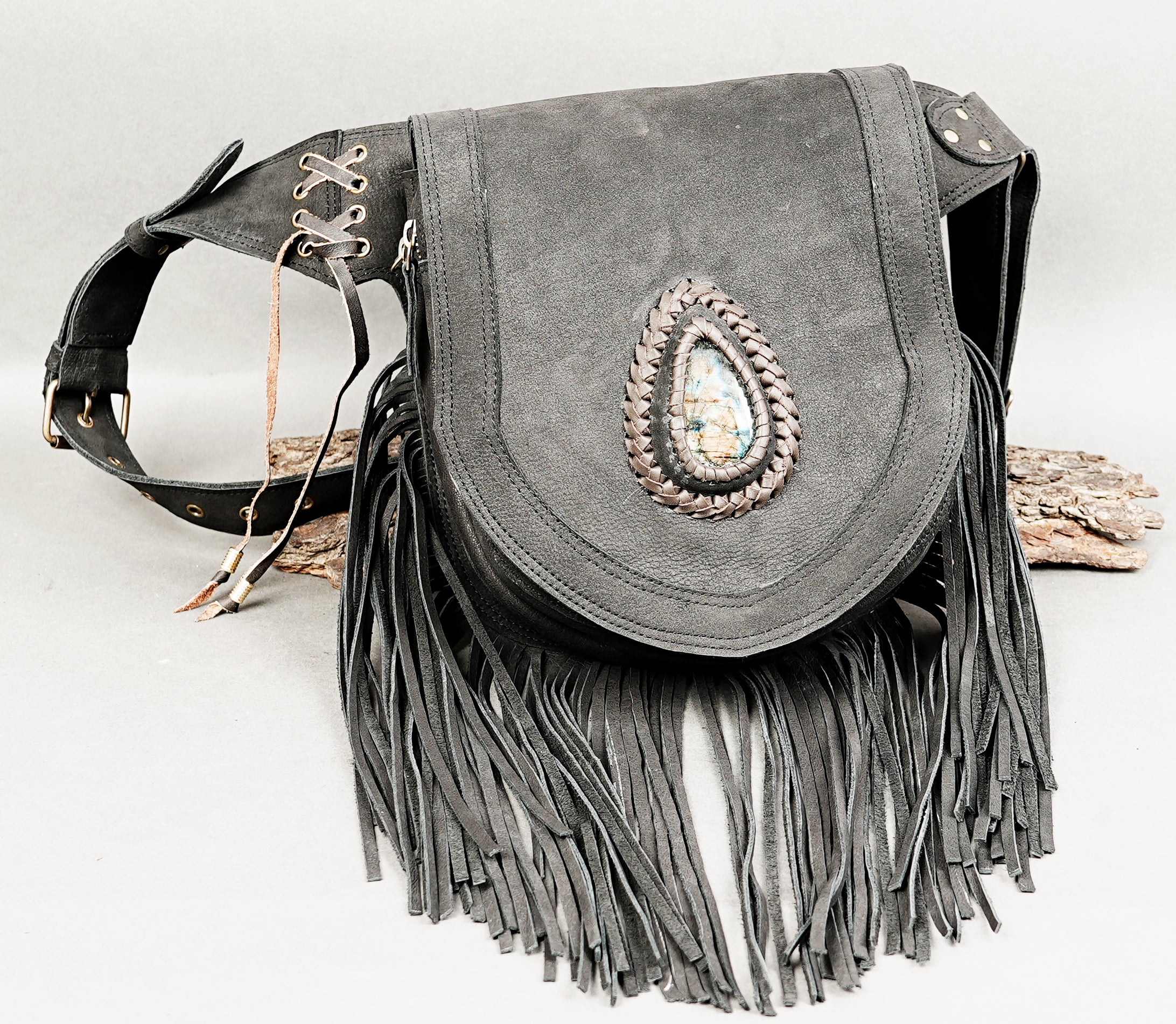 Adjustable leather waist belt with gemstone and long fringe