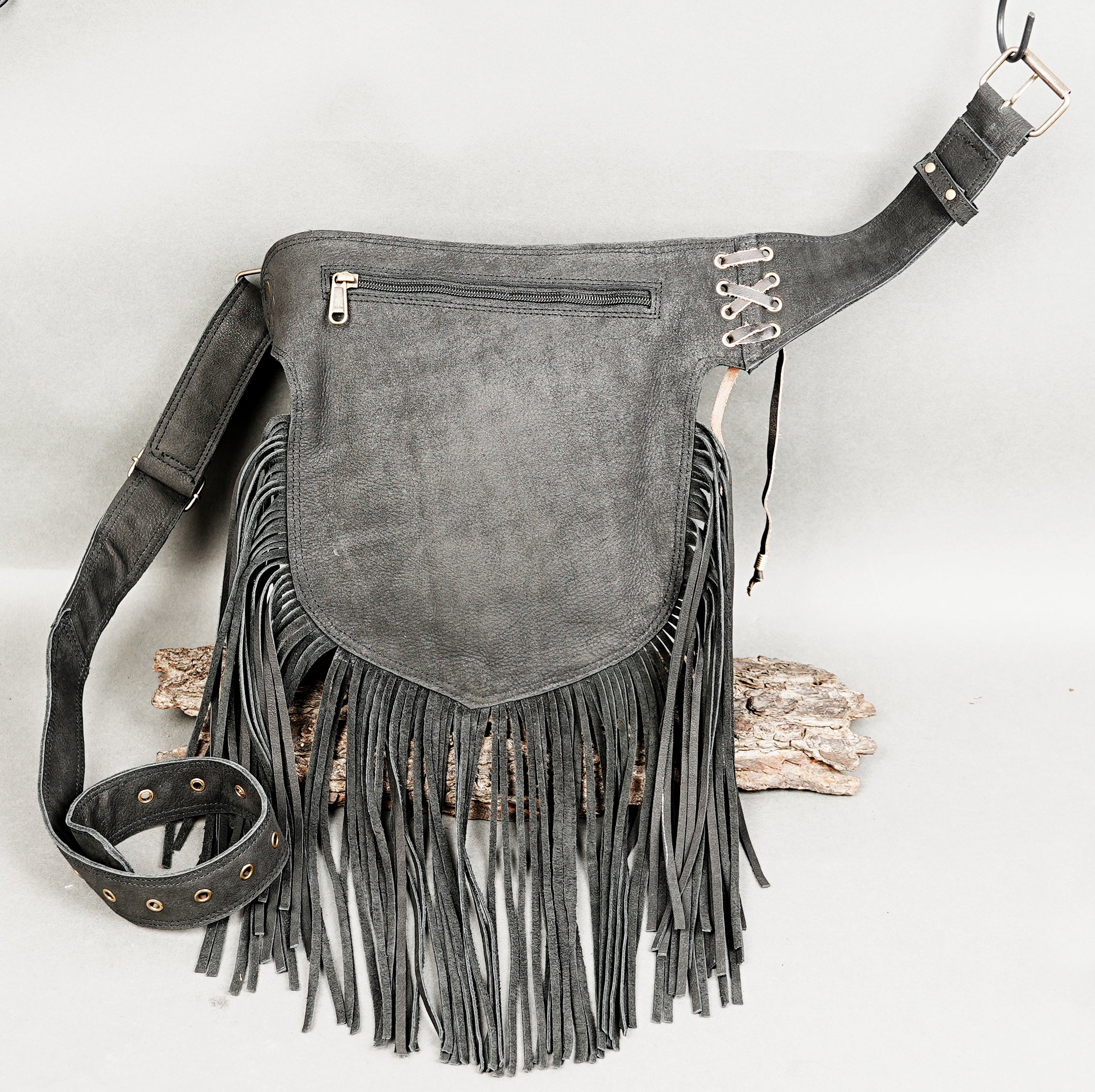 Black leather utility waist belt with fringe and decorative stitching